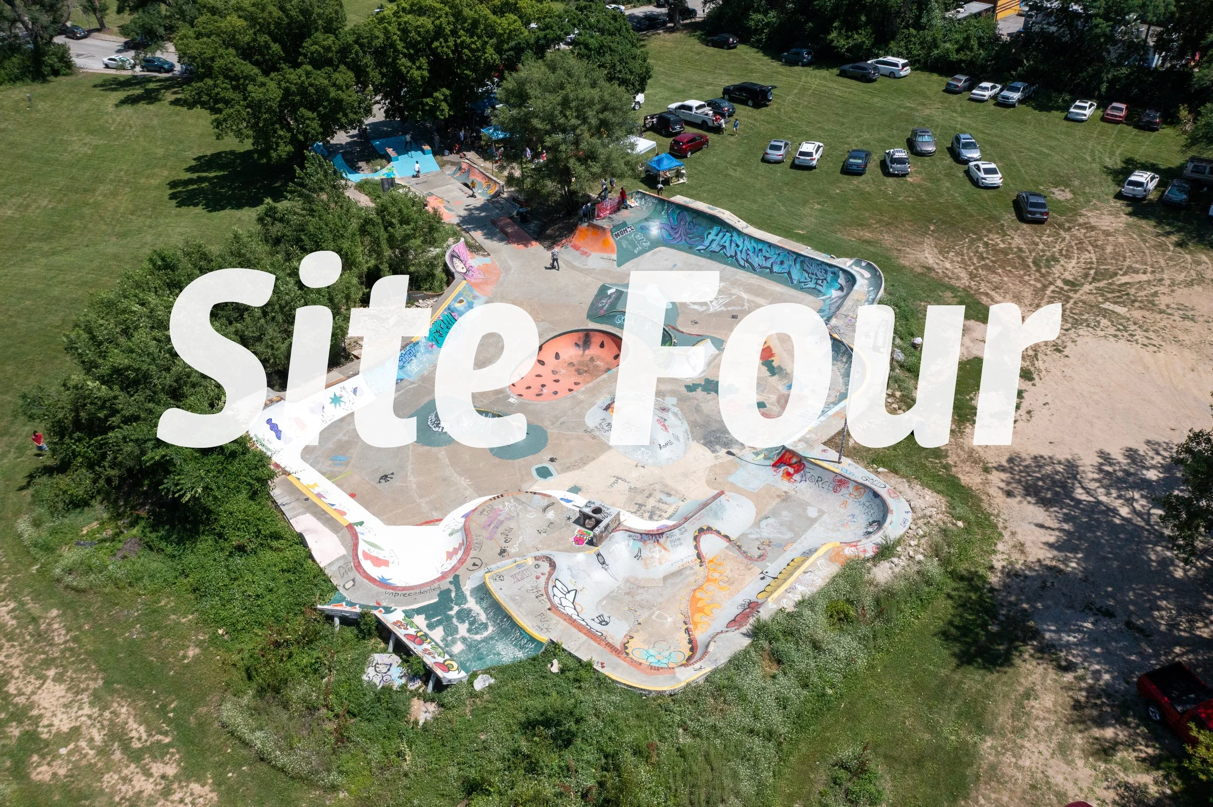 drone photo of harrison street diy skate park with large text spelling site 4 laid over the top