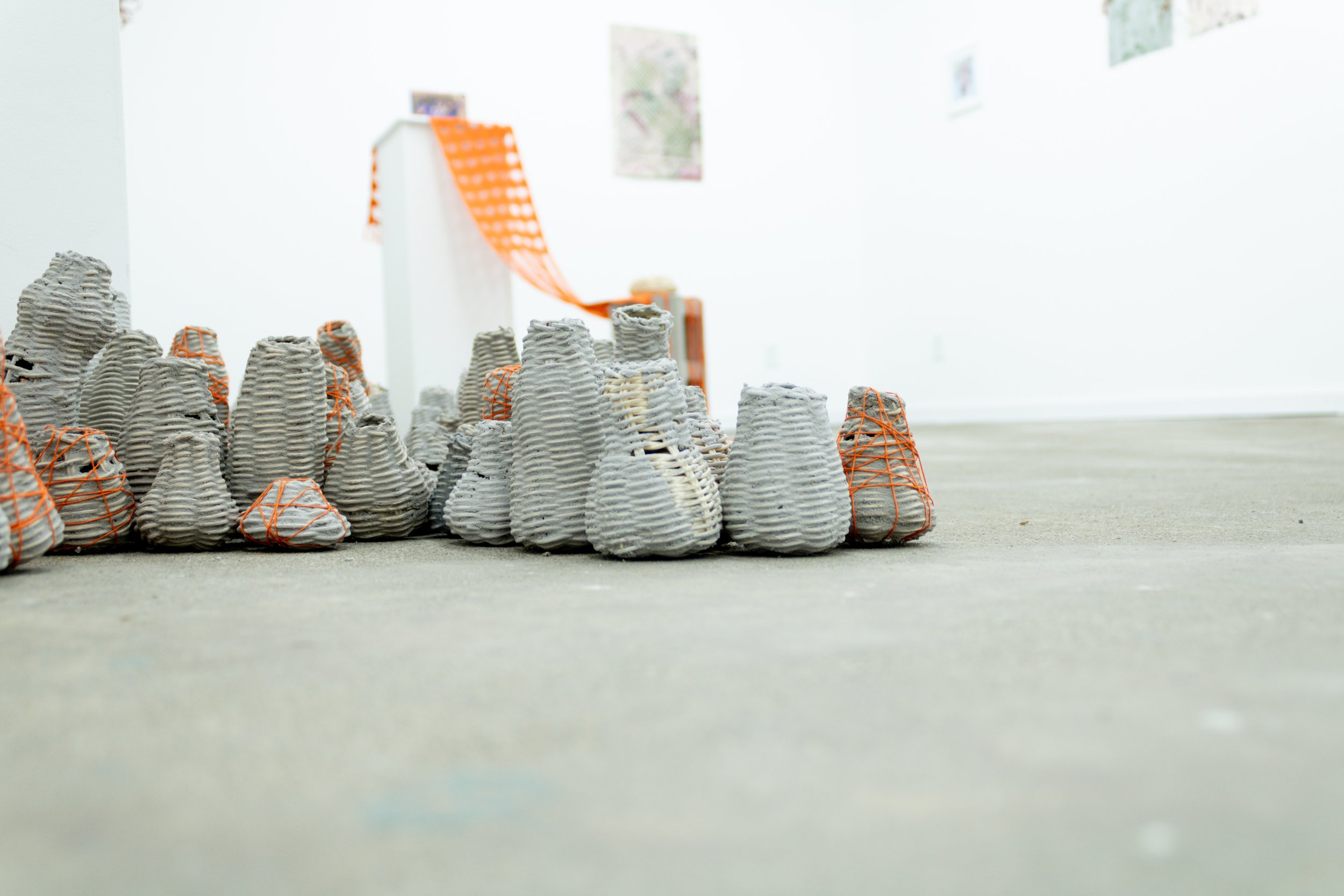 close up of hand-woven mini baskets by yasi farah