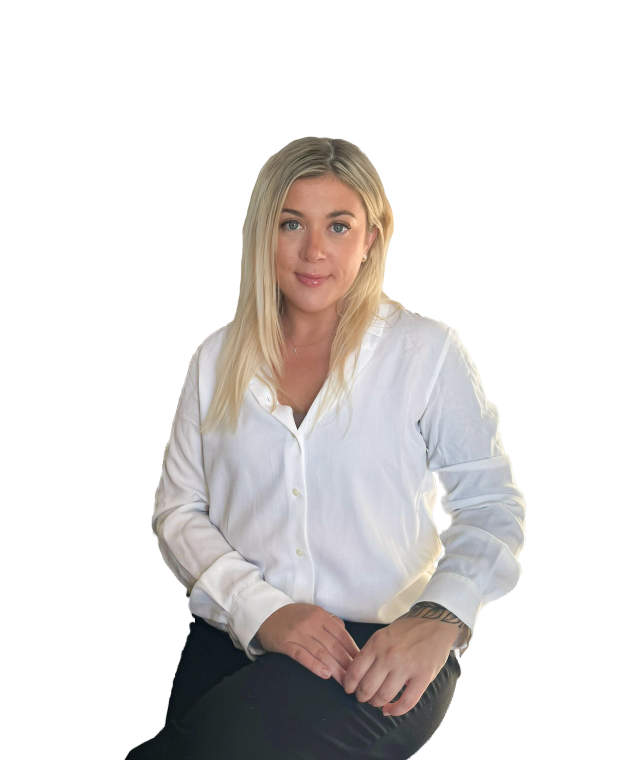 Portrait of a Vivid Design Studios team member seated in a studio setting.