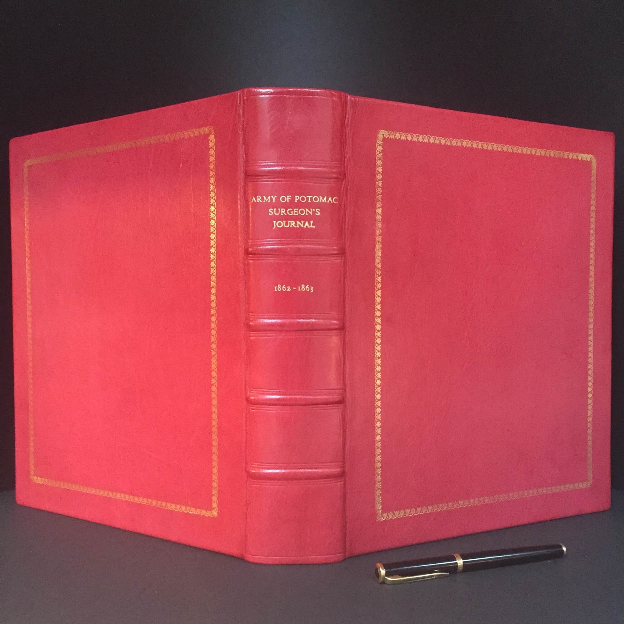  A presentation box for a small book, with a pocket in the lid for documentation to be inserted. 