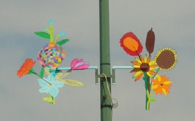 Childs painted the back side of the sculptures and the brackets.