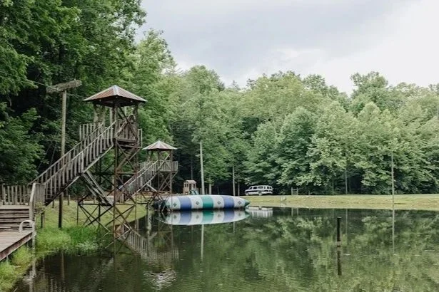 Zipline tower and our swimming area.