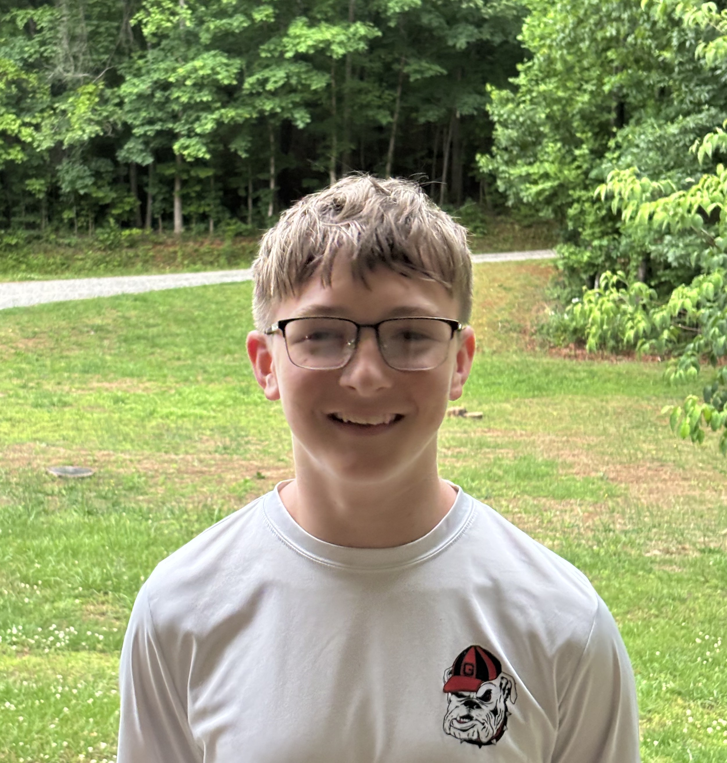 christian summer camp counselor smiling outdoors