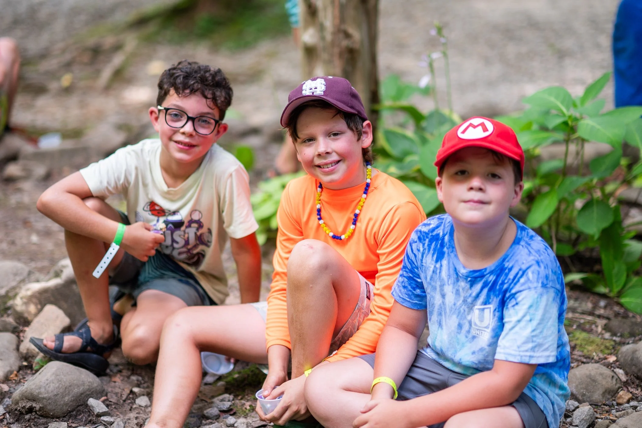 boys smiling outside at Christian summer camp 