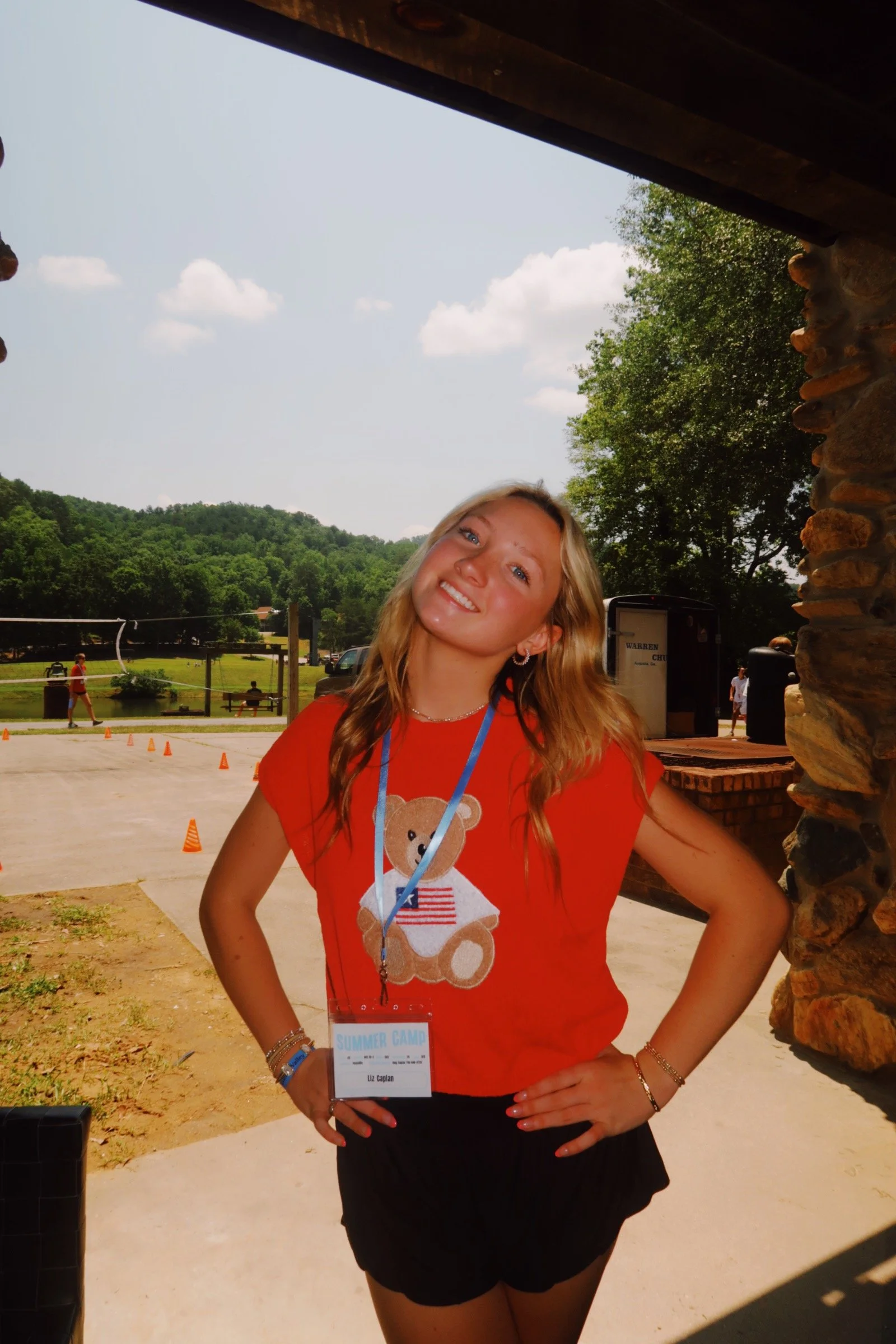 overnight summer camp counselor smiling