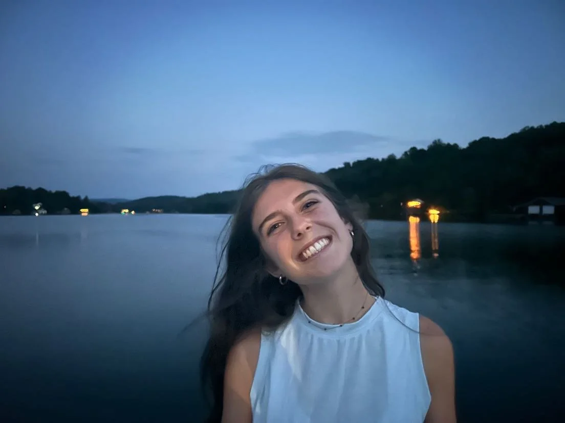 christian summer camp counselor smiling on north georgia lake