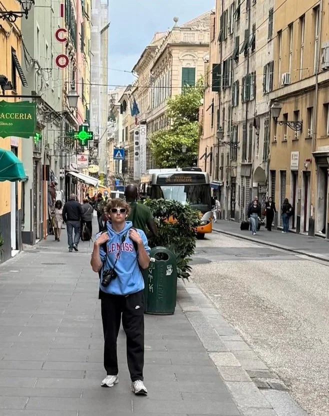 christian summer camp counselor smiling in city streets