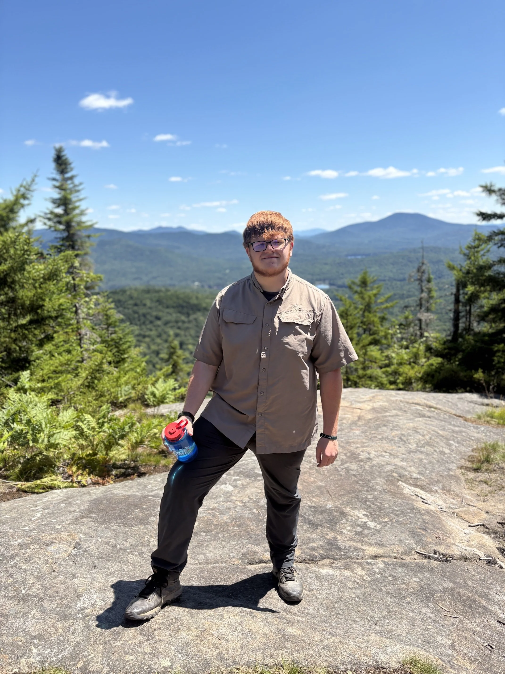 overnight summer camp counselor smiling