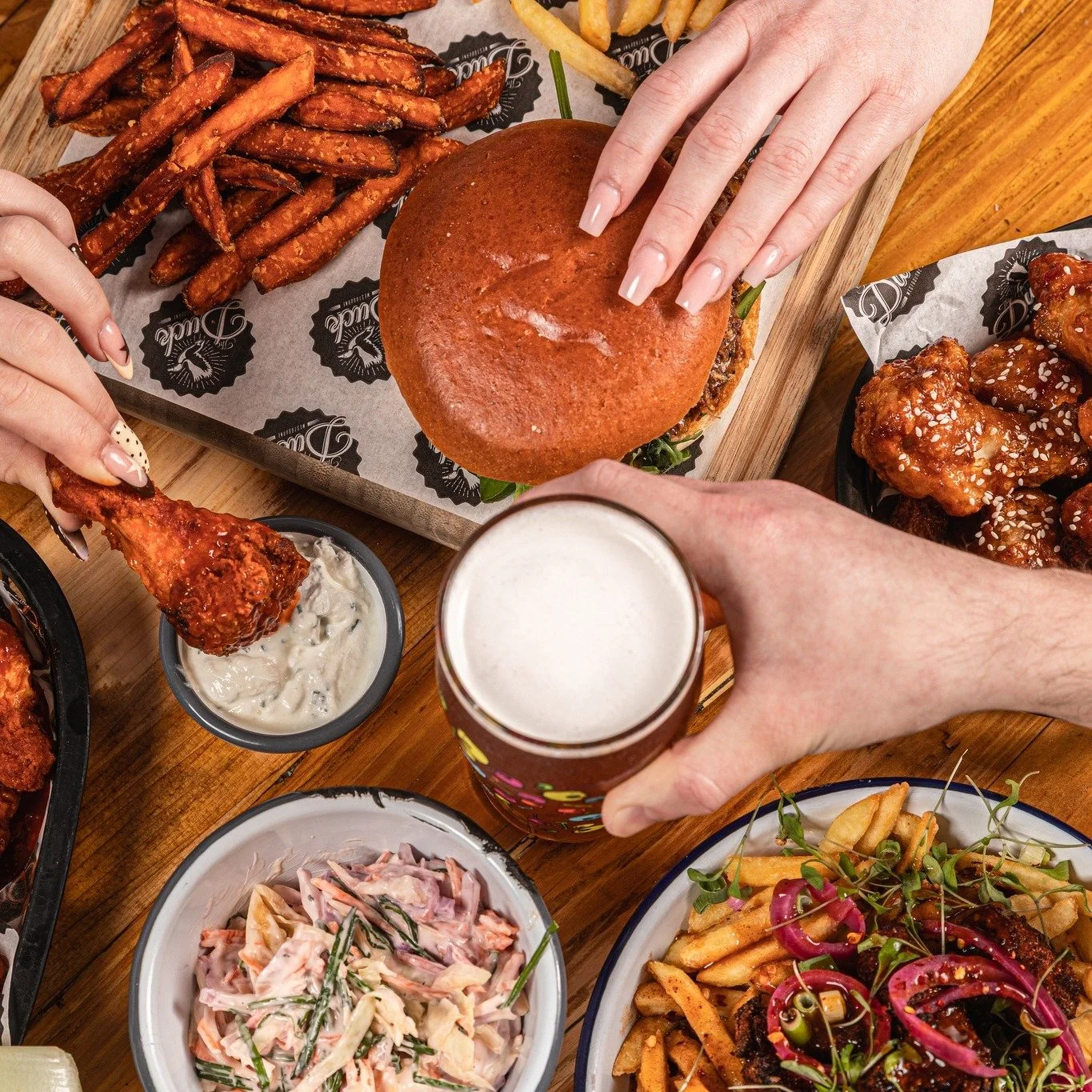 Food tastes better when everyone&rsquo;s involved 🍔🍗🍺

Join us for Sharing Sundays! Discounted platters made for moments like this 👀

 #sharing #food #grill