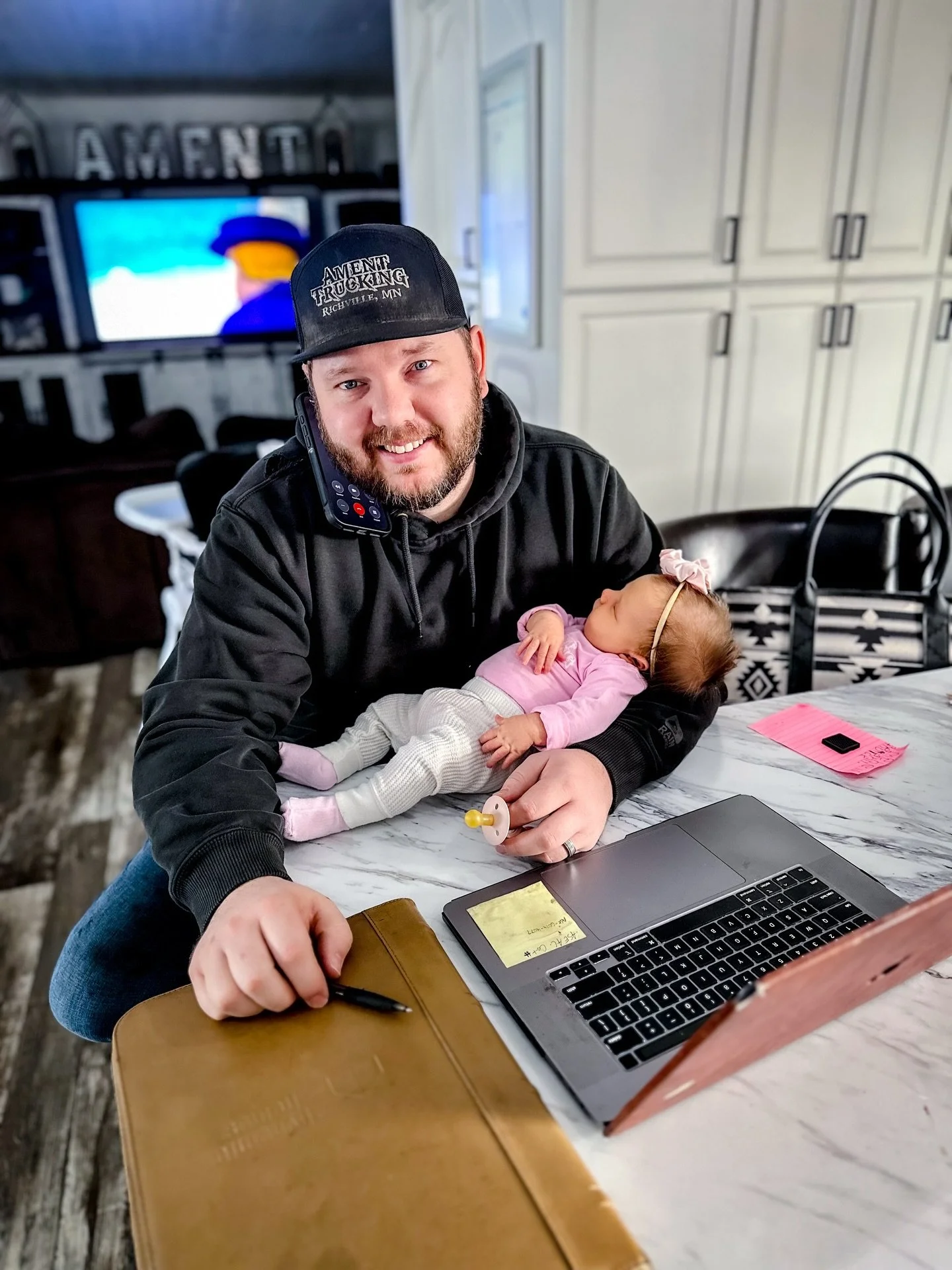 He&rsquo;s busy taking care of business, and she&rsquo;s busy stealing his heart 💖 Miss Briar will never have to worry about a thing the way she has her Daddy wrapped around her little finger already 😜 

Cutest little onesie from our favorites at @