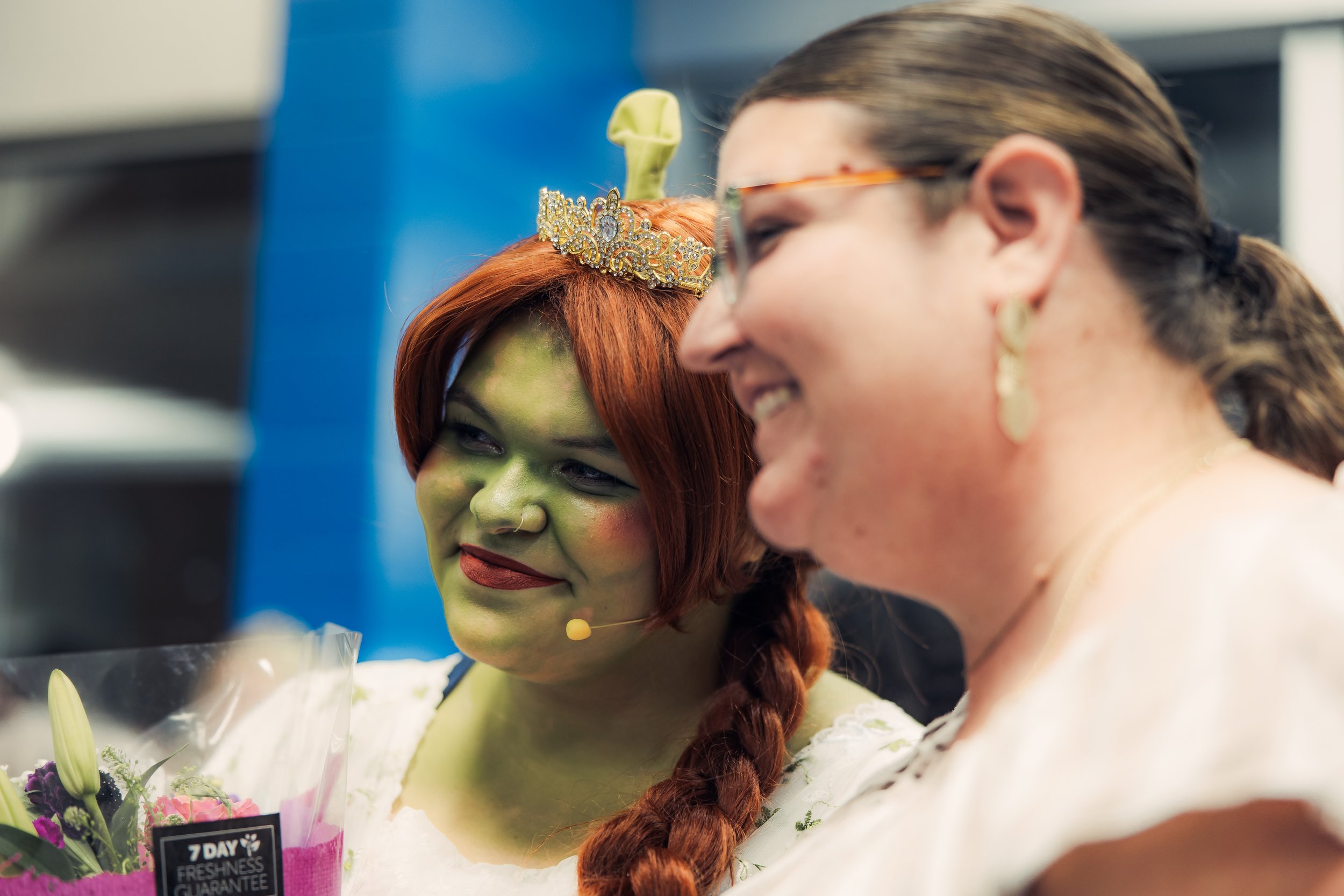 Fiona shares a smile with another person after the performance.