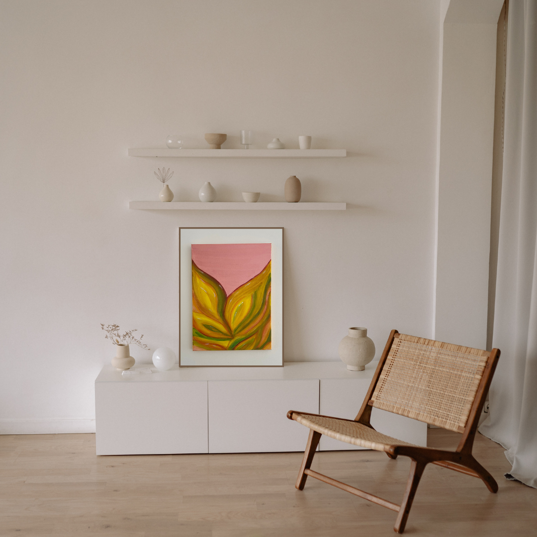 This vibrant abstract acrylic painting combines golden yellow, earthy green, and soft orange tones with a muted blush pink background. Featuring bold, organic shapes and layered brushwork, this original artwork exudes warmth and movement, making it a