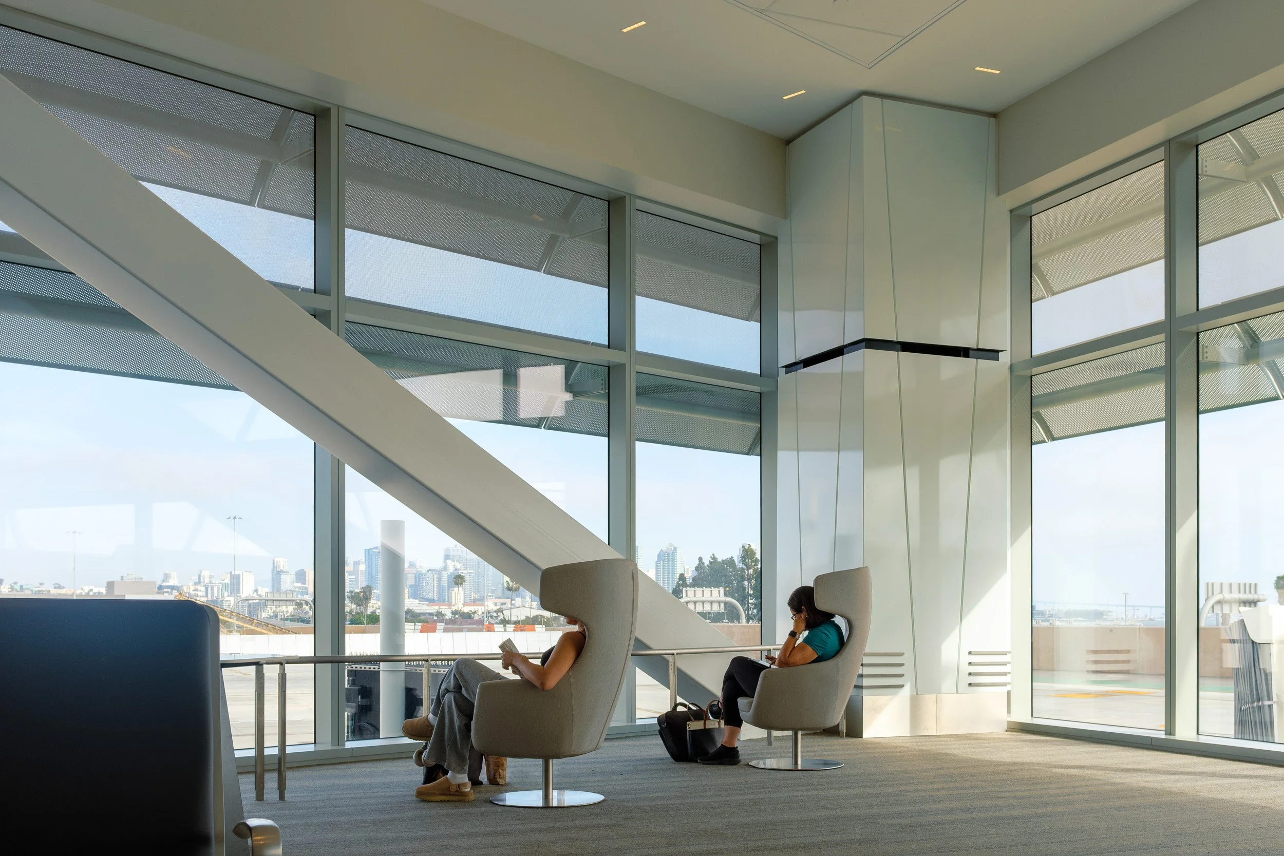 San Diego International Airport New Terminal 1, architecture by Gensler, constructed by Turner Construction and FlatironDragados, structural engineering by Magnusson Klemencic Associates - Detail of Terminal Lounge Seating by Windows