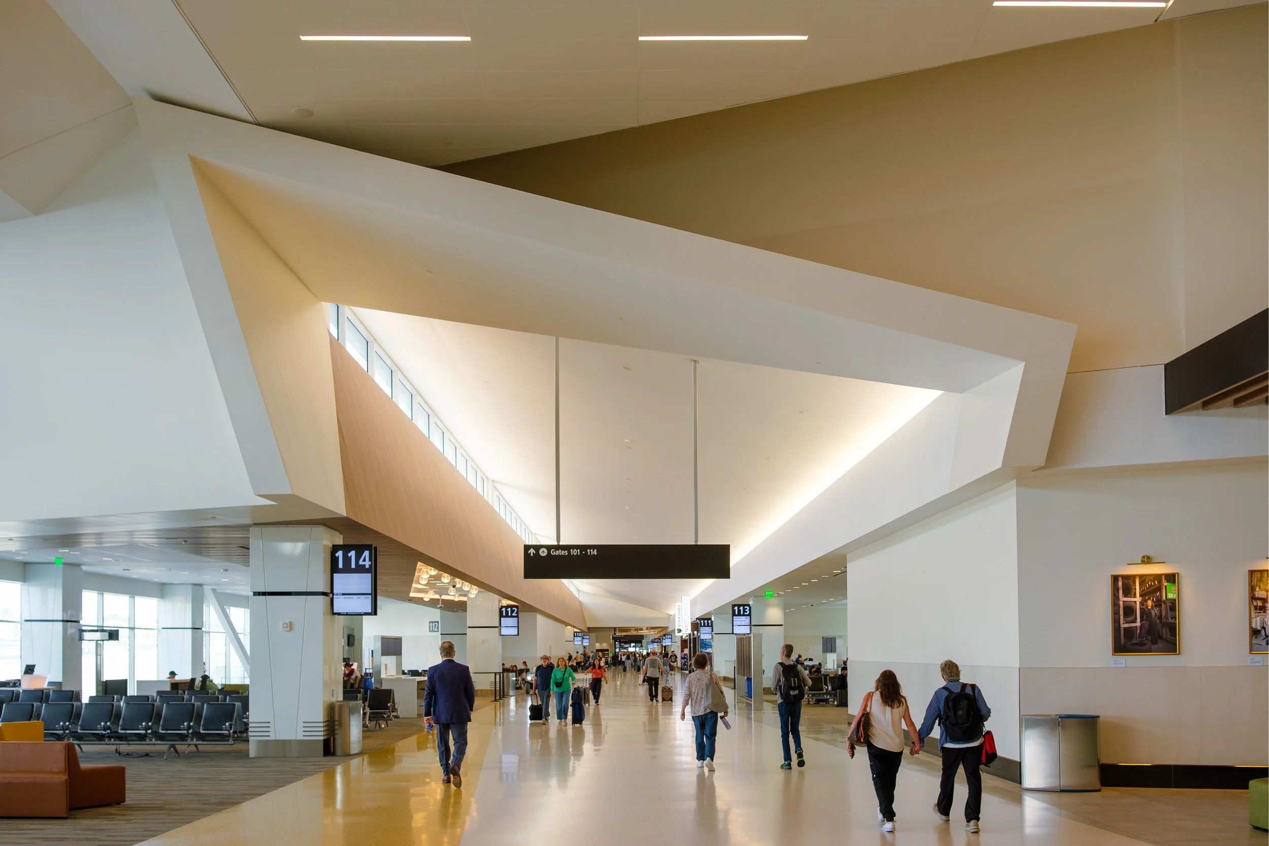 San Diego International Airport New Terminal 1, architecture by Gensler, constructed by Turner Construction and FlatironDragados, structural engineering by Magnusson Klemencic Associates - Wide Terminal Archeticural Hallway Facade Image