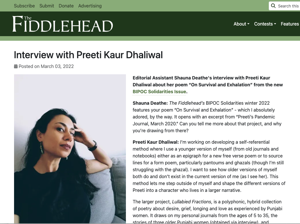 Photograph of Preeti Kaur Dhaliwal posing indoors, with her left hand resting on her head and gazing to the side, wearing a black top and gold earrings.