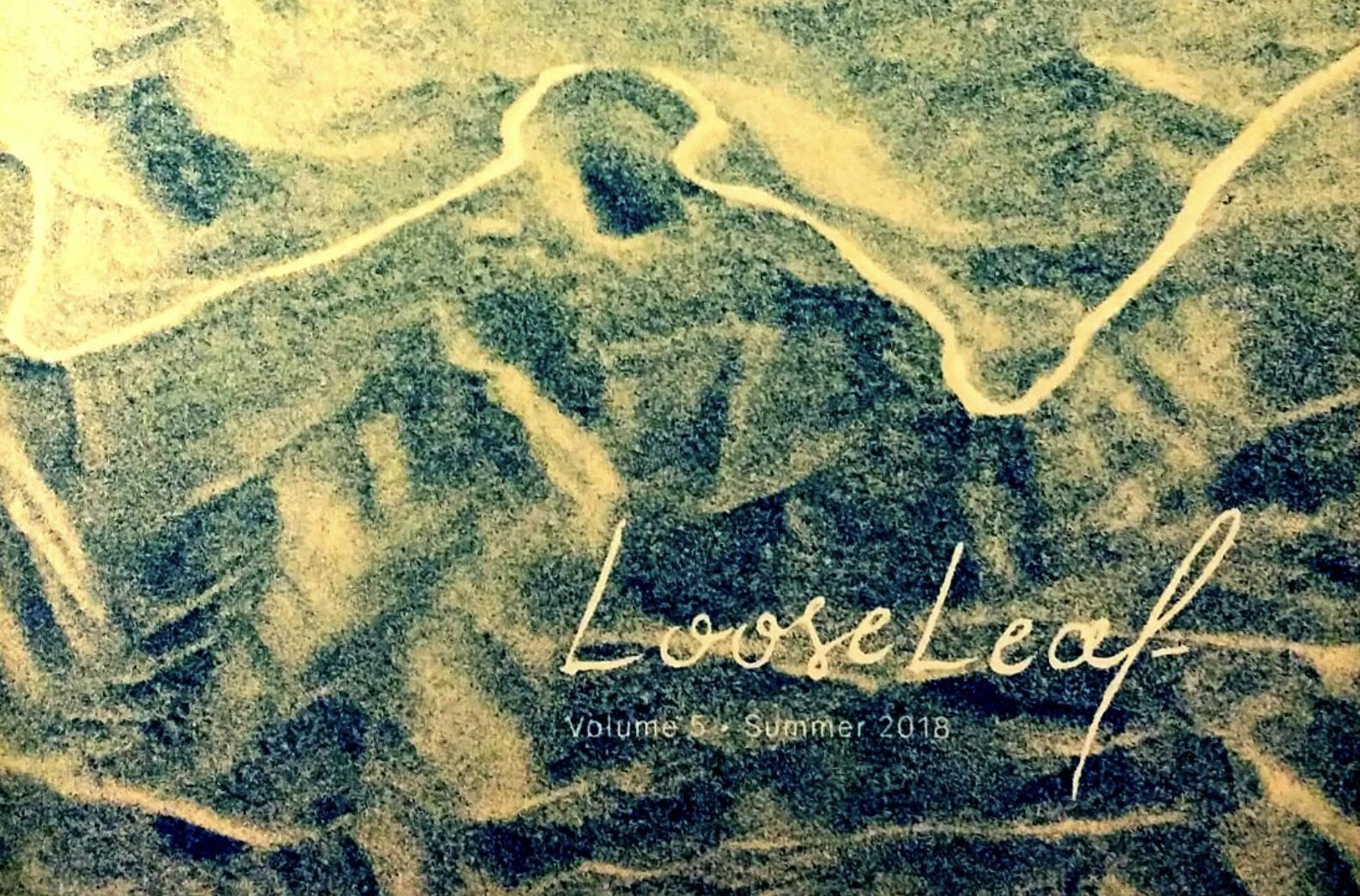Close-up of a book cover titled 'Loose Leaf,' with subtitle 'Volume 3 Summer 2018,' featuring abstract, layered, textured green and yellow patterns.