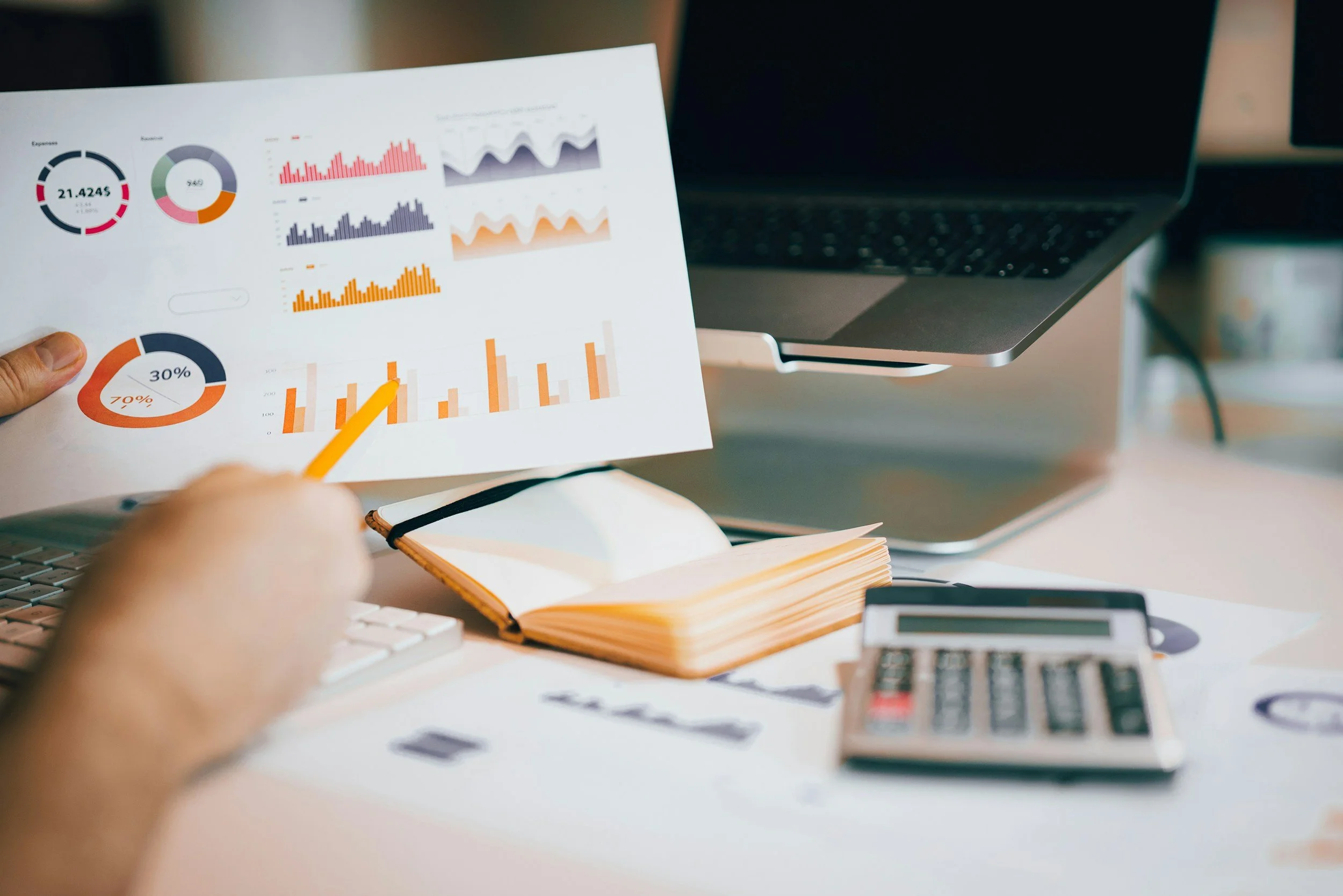 Stock photo of marketing performance charts — represents Mayfield Express reporting and analysis services that help small business owners measure what works