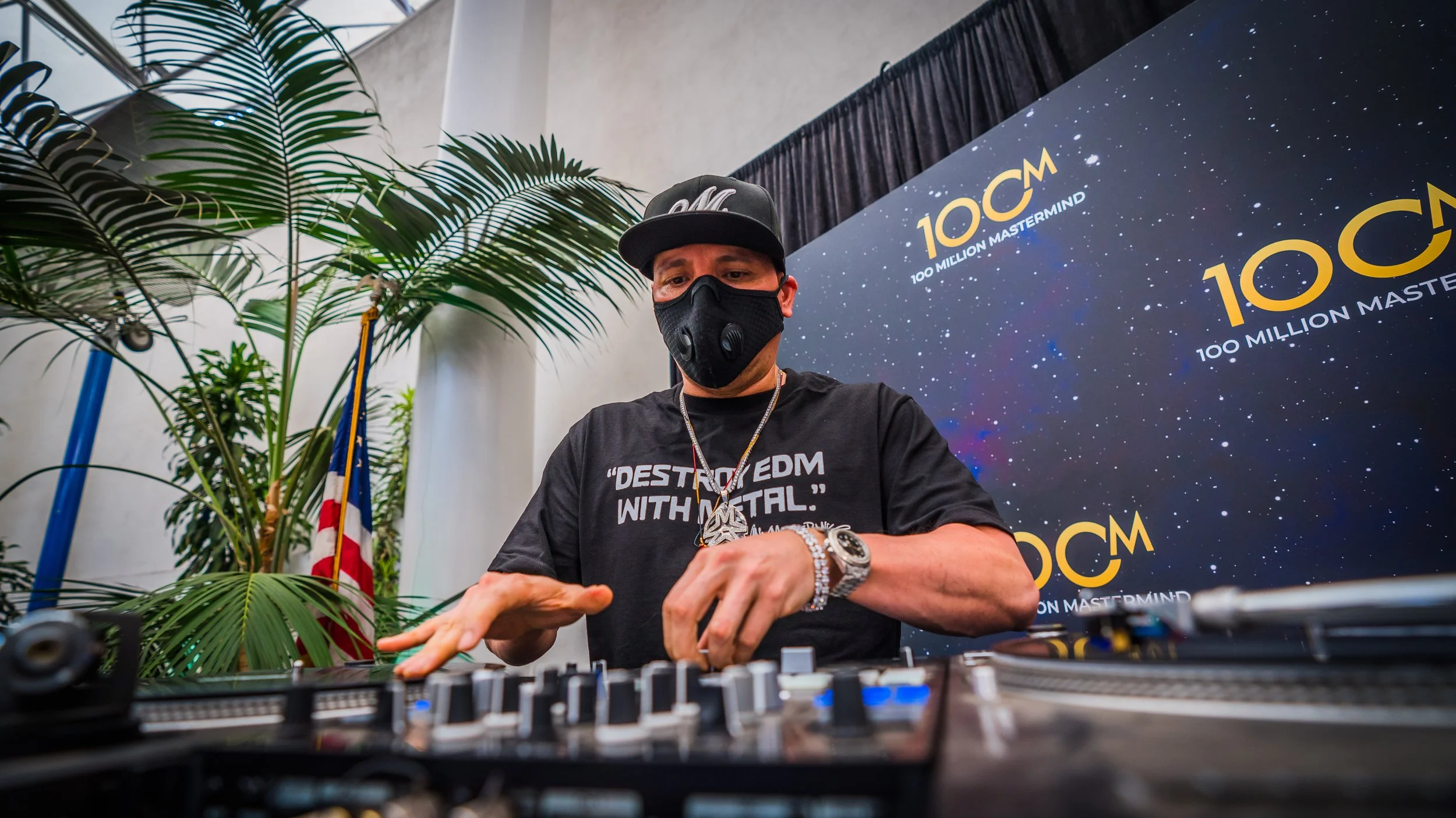 Event media photo of DJ performing at 100 Million Mastermind — captured by Magana Productions for live event coverage.
