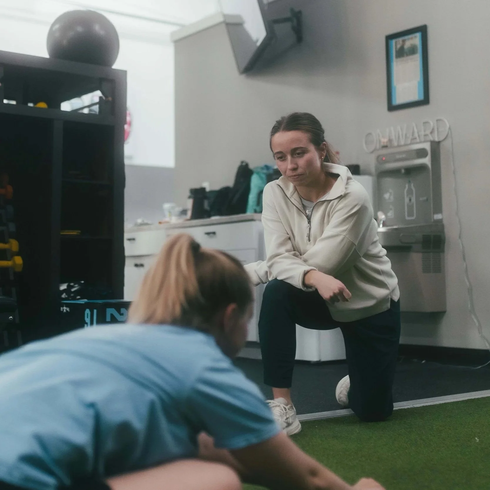 Athlete doing Physical Therapy  at Upward Performance Grain Valley