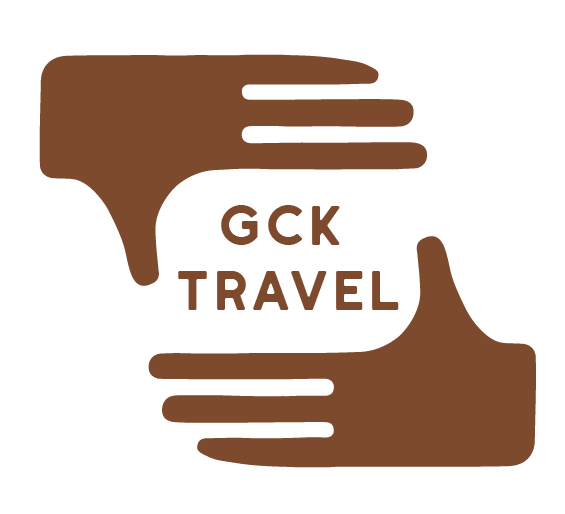 Logo with two hands forming a square, with the words "GCK TRAVEL" inside