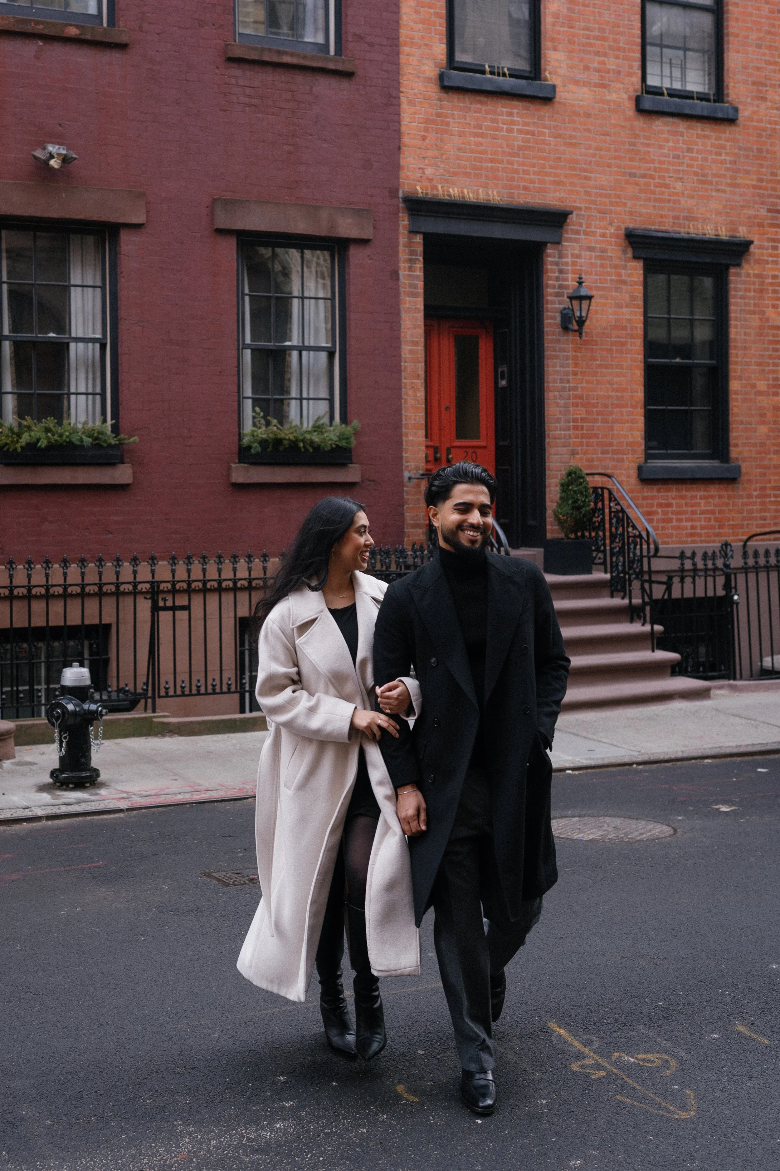 Couple walking towards camera in the West Village
