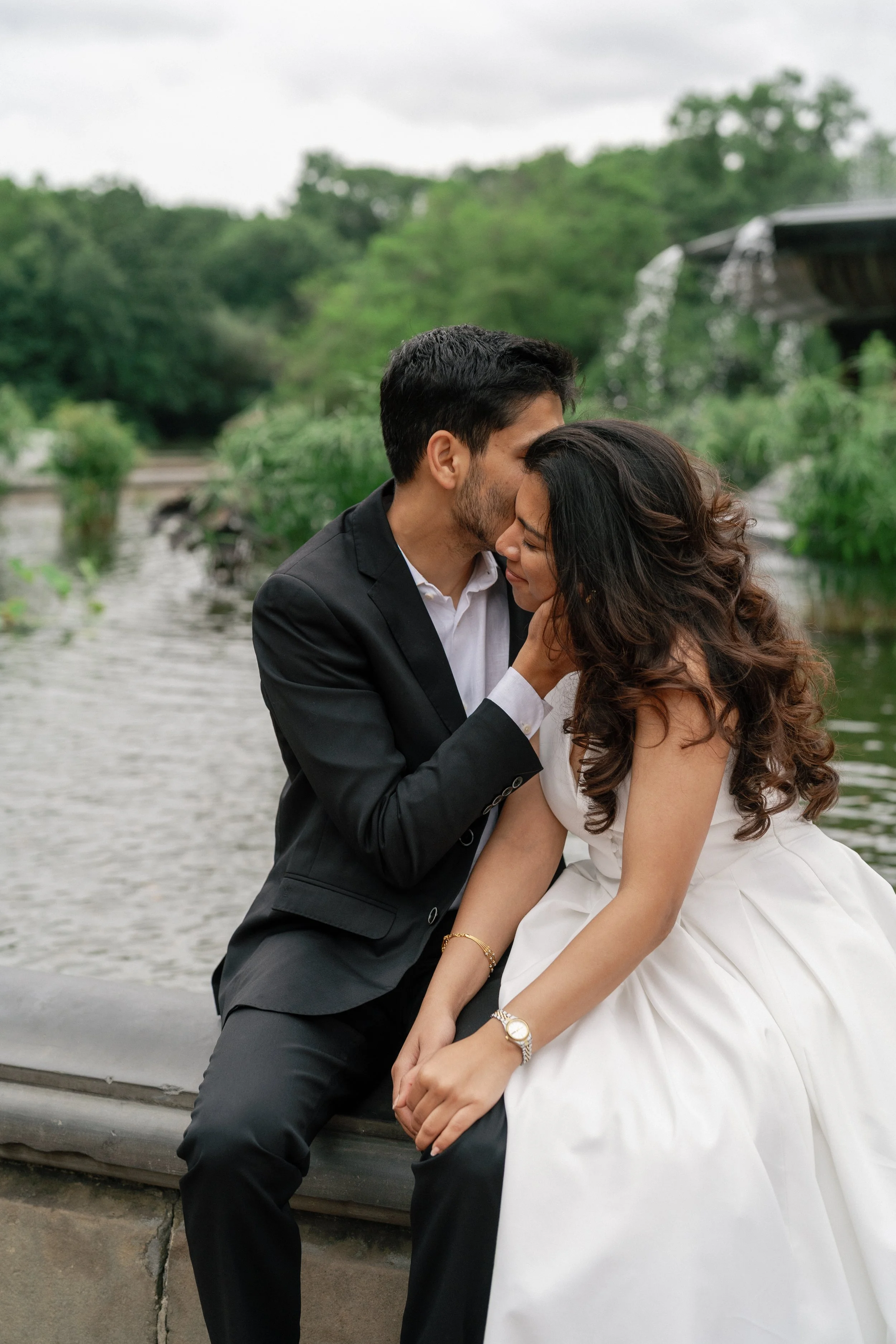 Couple sitting by the Bethesda Fountain in Central Park
