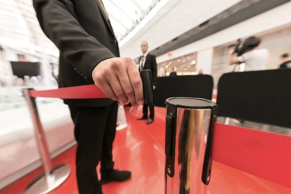 Event security in a Los Angeles celebrity event guarding the red carpet area