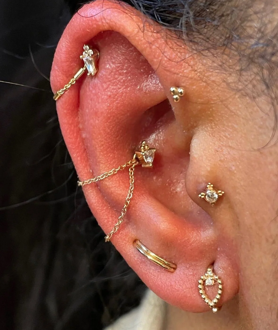 ear piercings at the right eye