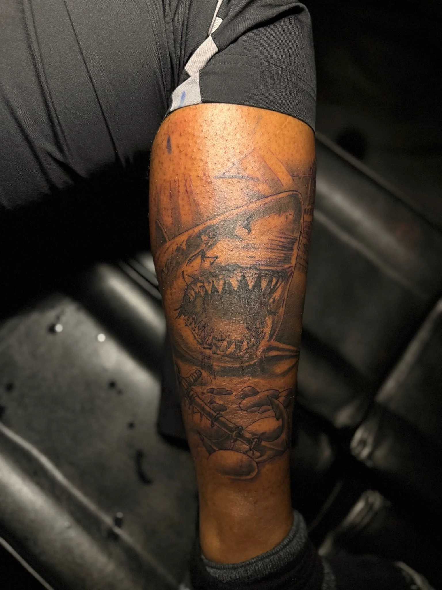 huge tattoo design in the arm