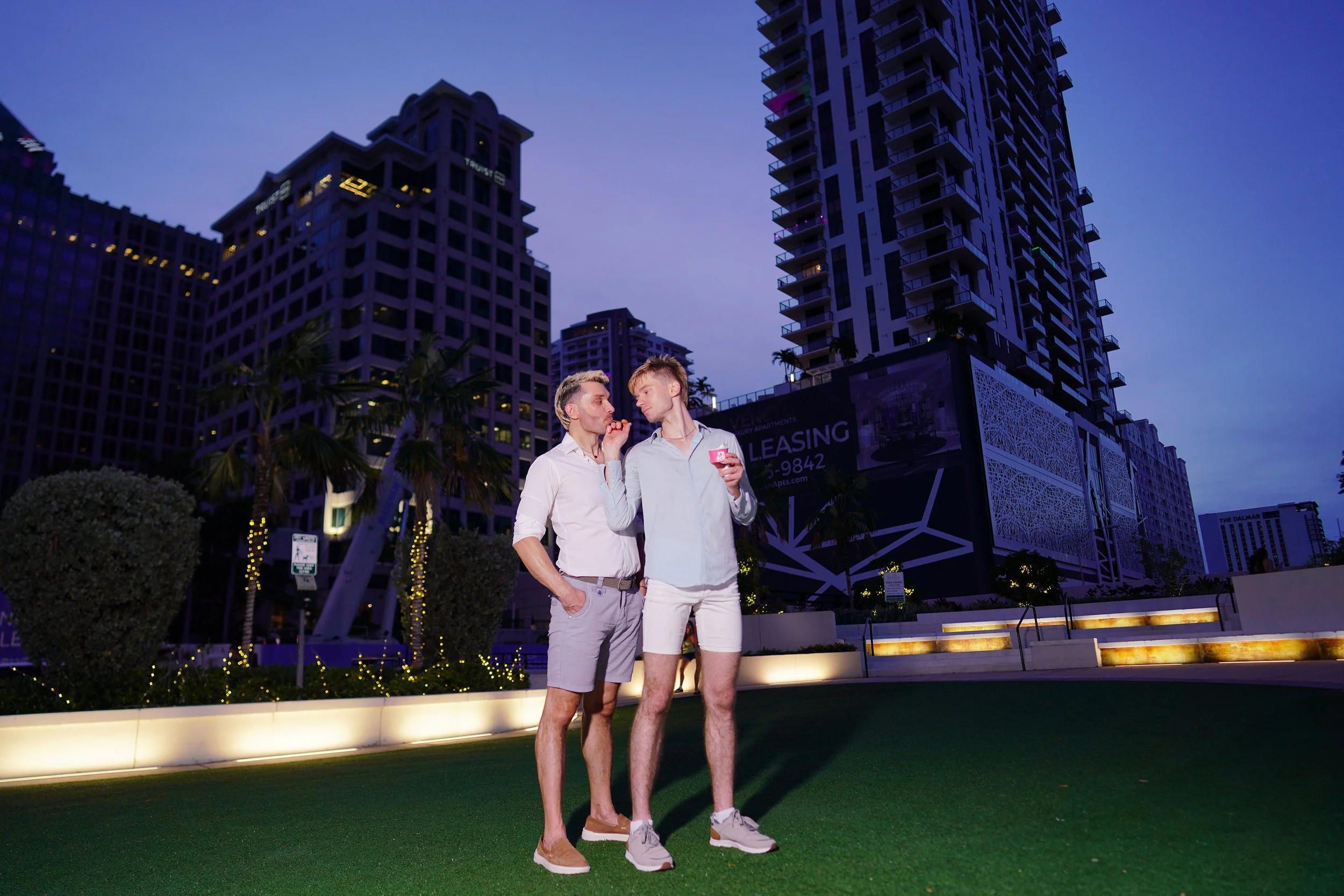 Urban gay wedding photography against a city skyline, captured by a premier wedding photographer based in San Francisco, California.