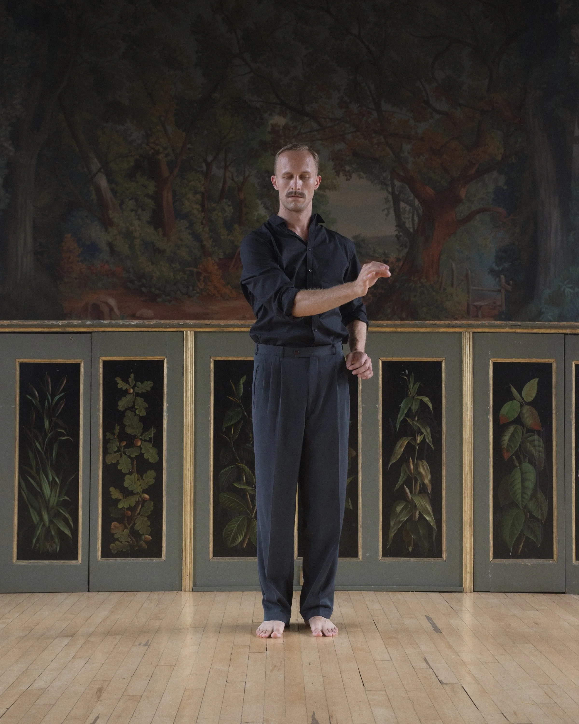 Editorial photograph of a performer exploring gesture and presence, commissioned in collaboration with Tanztheater Wuppertal Pina Bausch.
