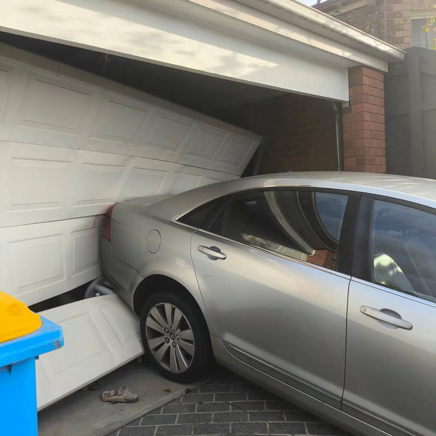 Work orders are usually pretty vague, which can be annoying. This job came through saying that the car was stuck on the door, so we asked for some photos. It didn't take long to work out that it was going to be another fun late night.

It took a litt