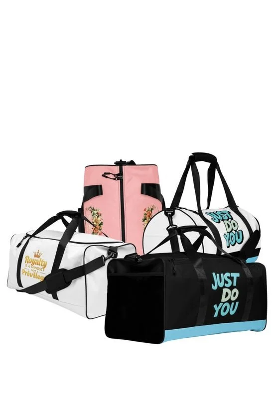 Four sports duffle bags in various colors and designs, including pink with floral pattern, white with black accents and gold text, white with black and blue "Just Do You" phrase, and black with blue accents and "Just Do You" text.