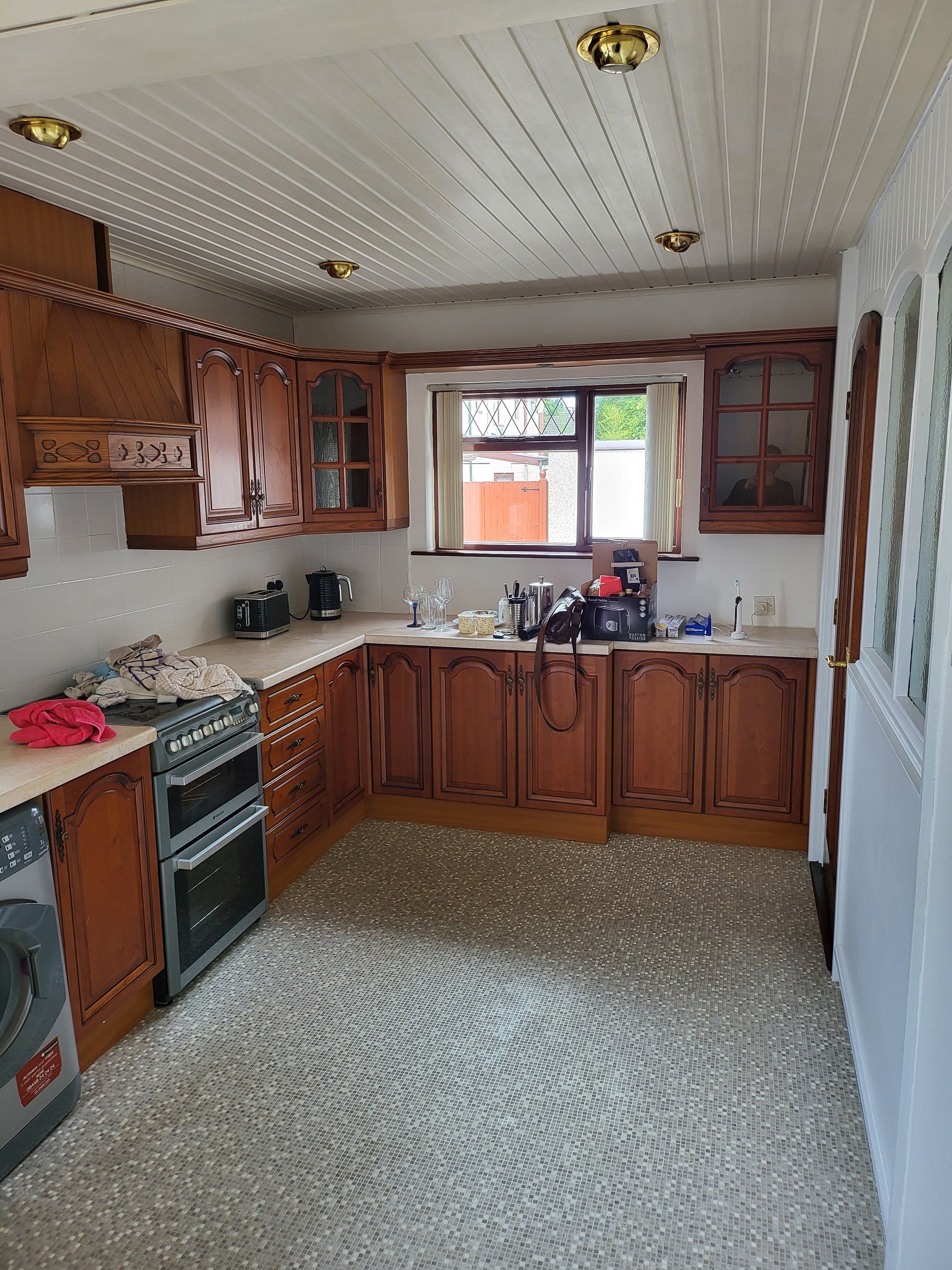 Freshened ceiling, painted tiles and walls