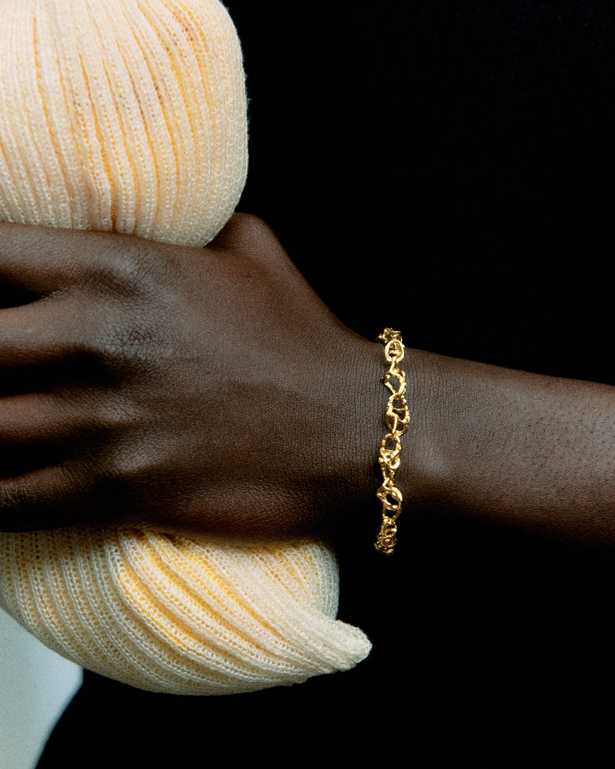 flowbraceletgoldarm.jpg