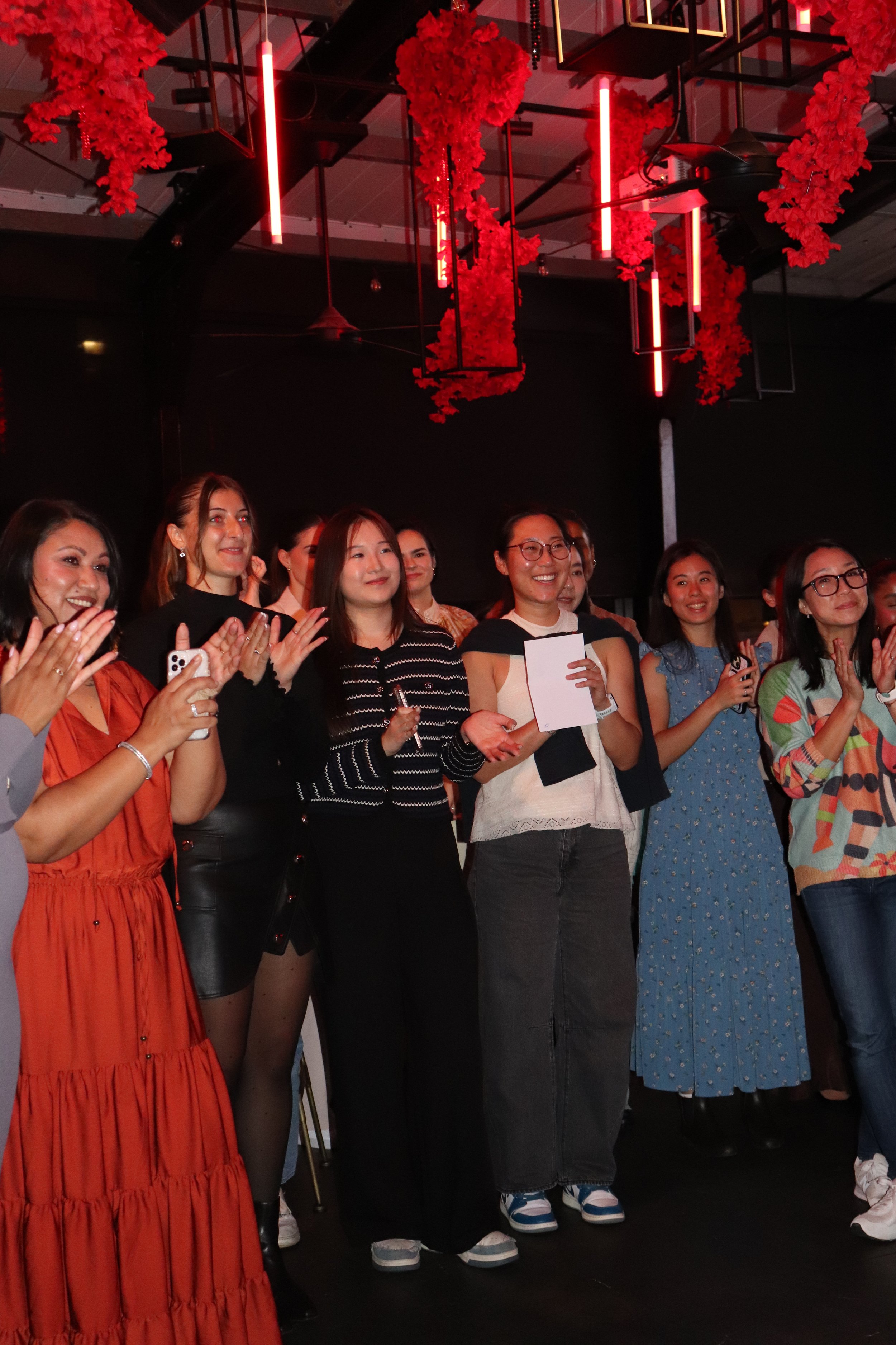 Women clapping