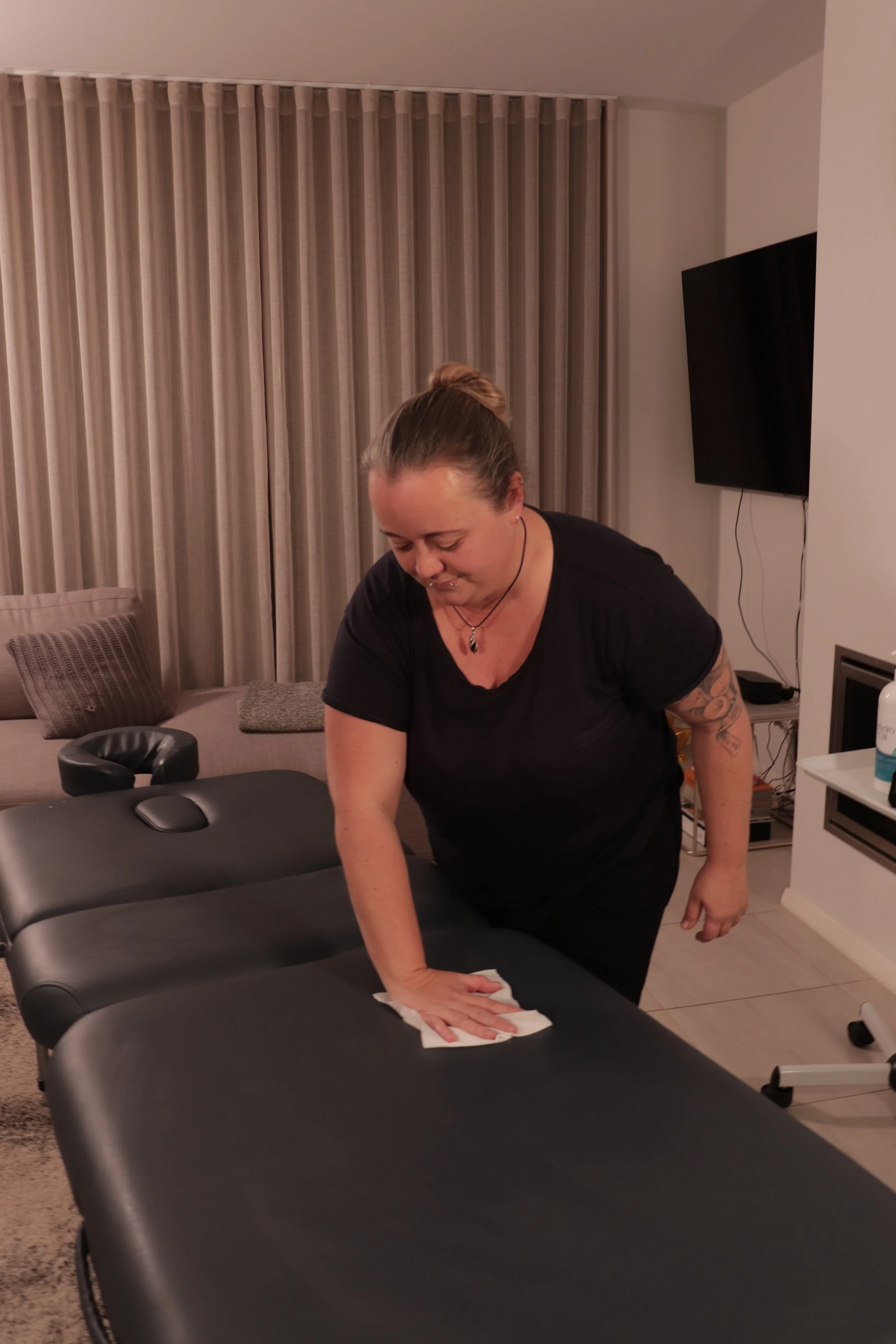 Kylie cleaning massage table