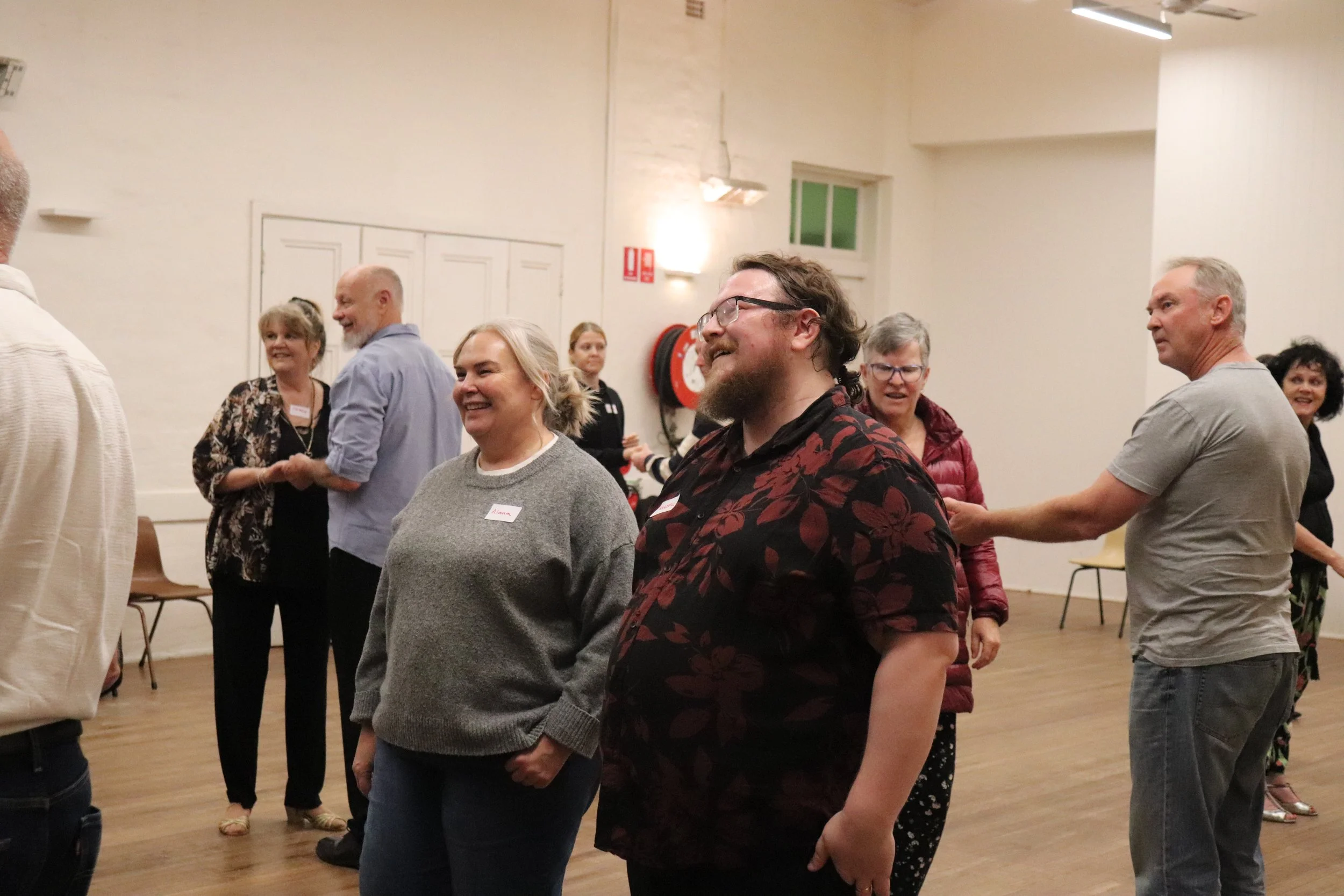 People smiling in dance class