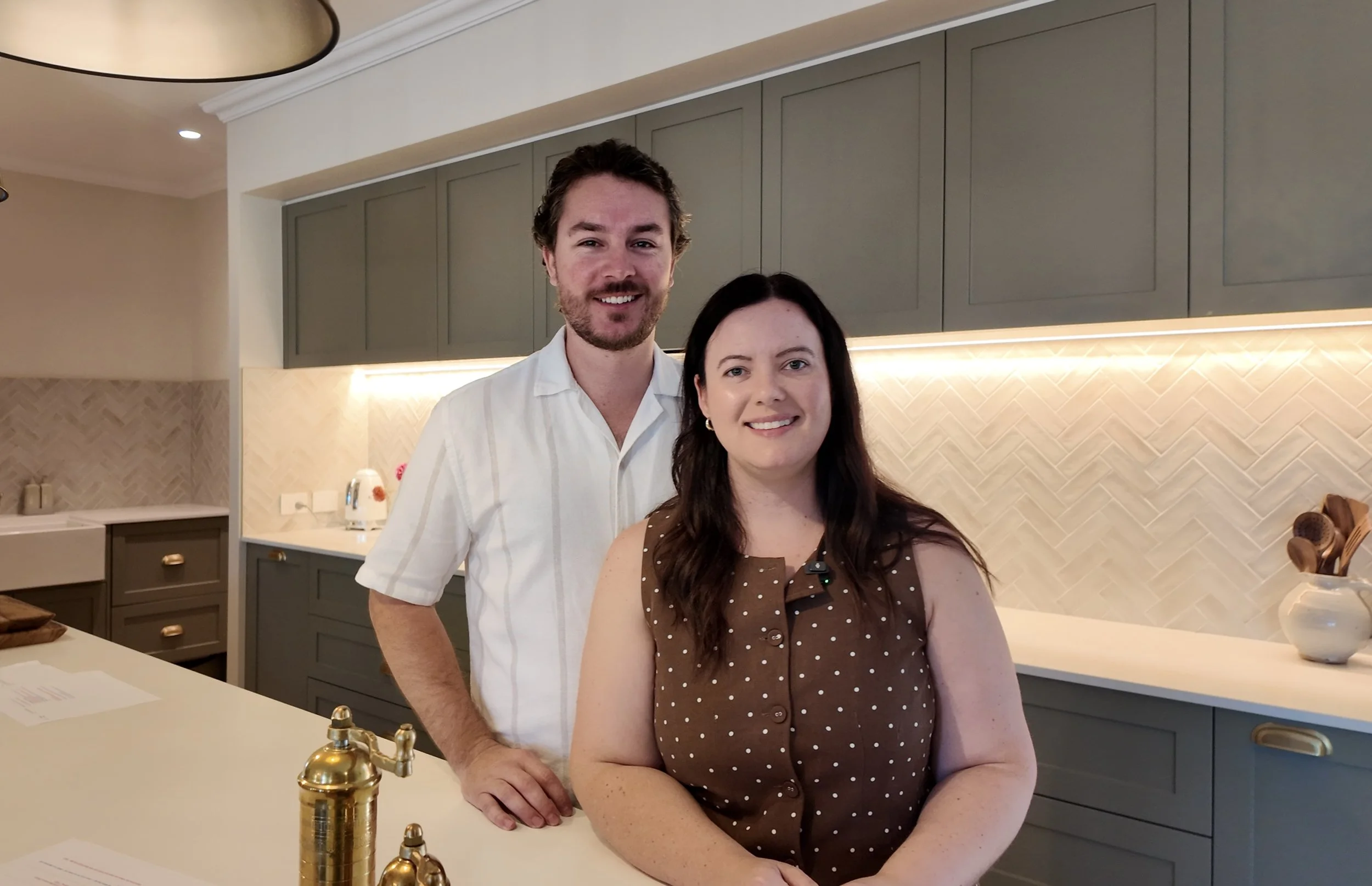 Photo of Mel and Josh in kitchen