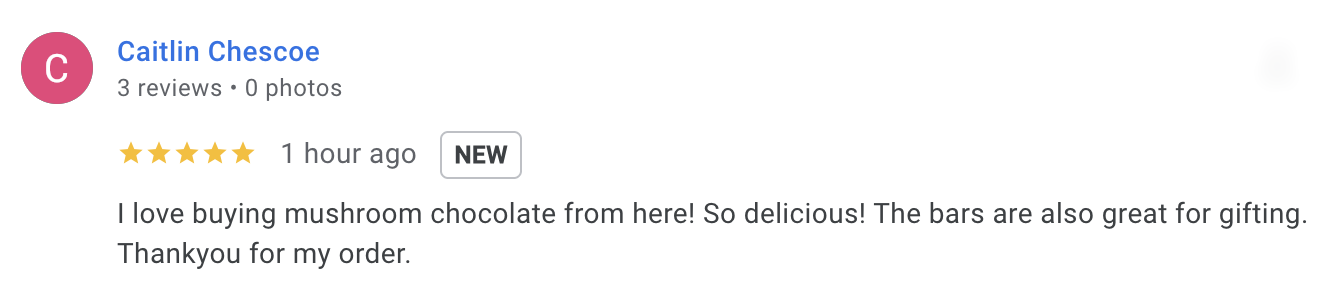 Screenshot of a customer review on a website, showing the customer's name, review star rating, and a comment praising mushroom chocolate bars for their taste and gifting.