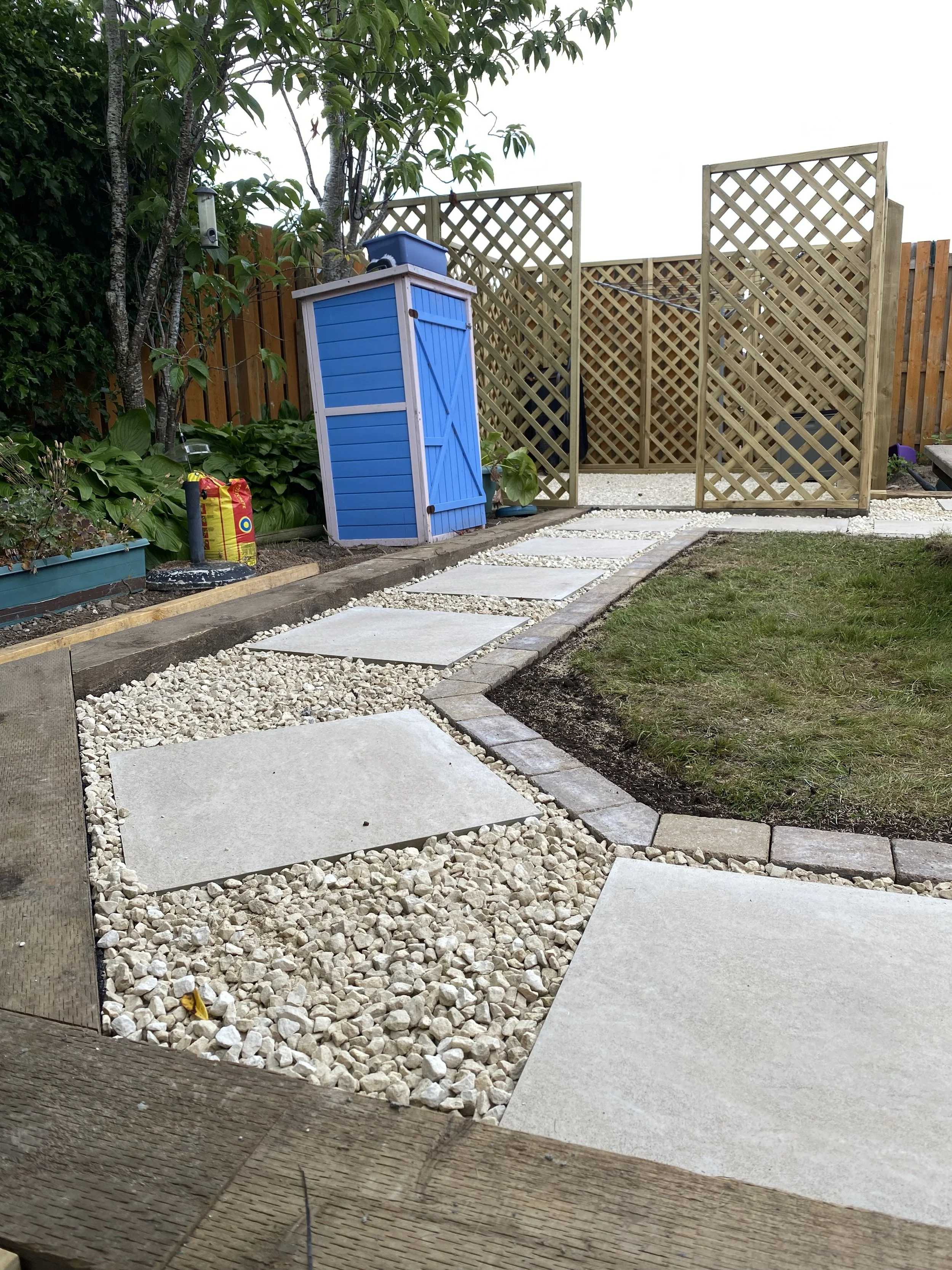 porcelain walkway and trellis utility area