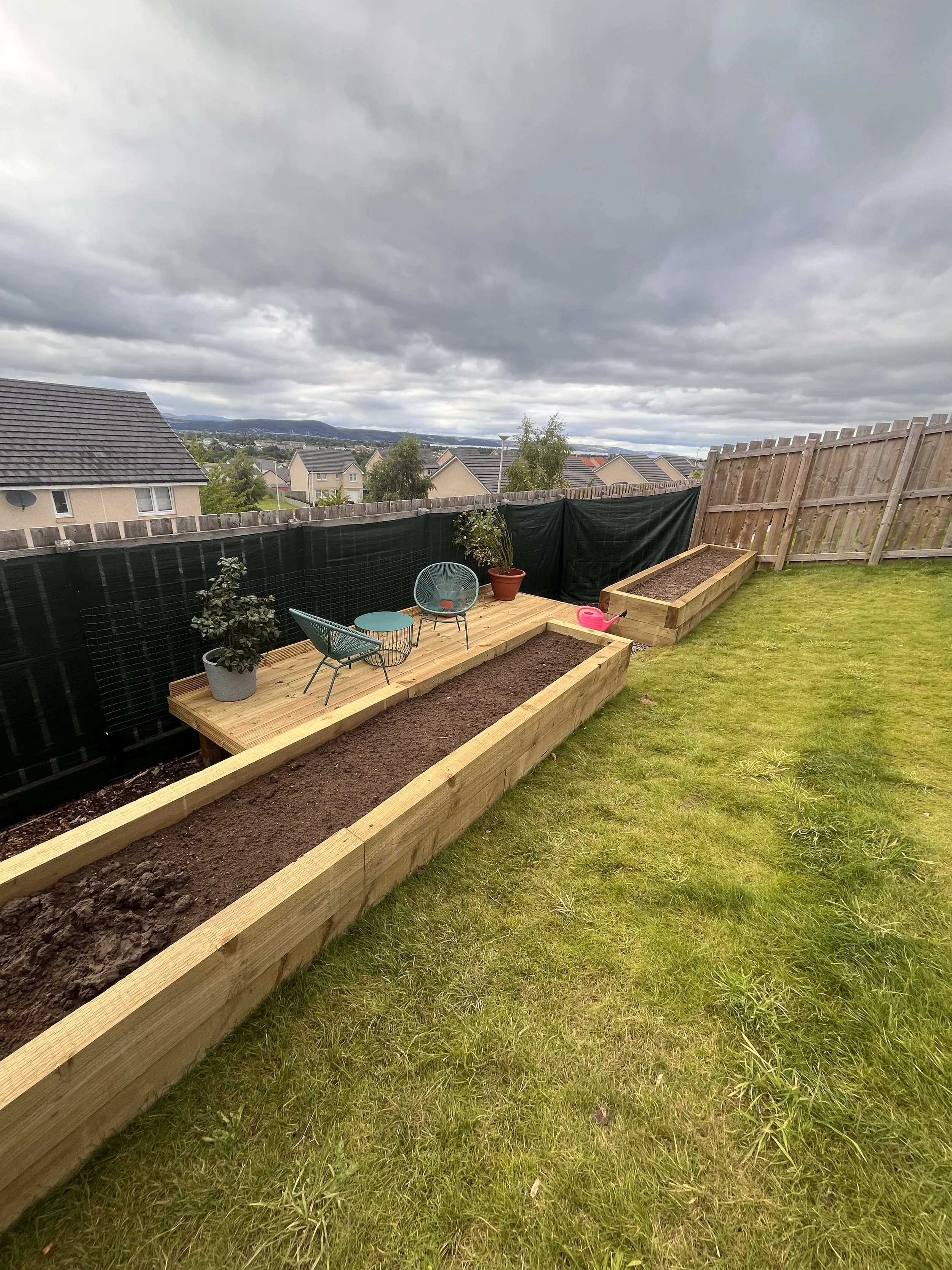 raised deck and timber planter beds