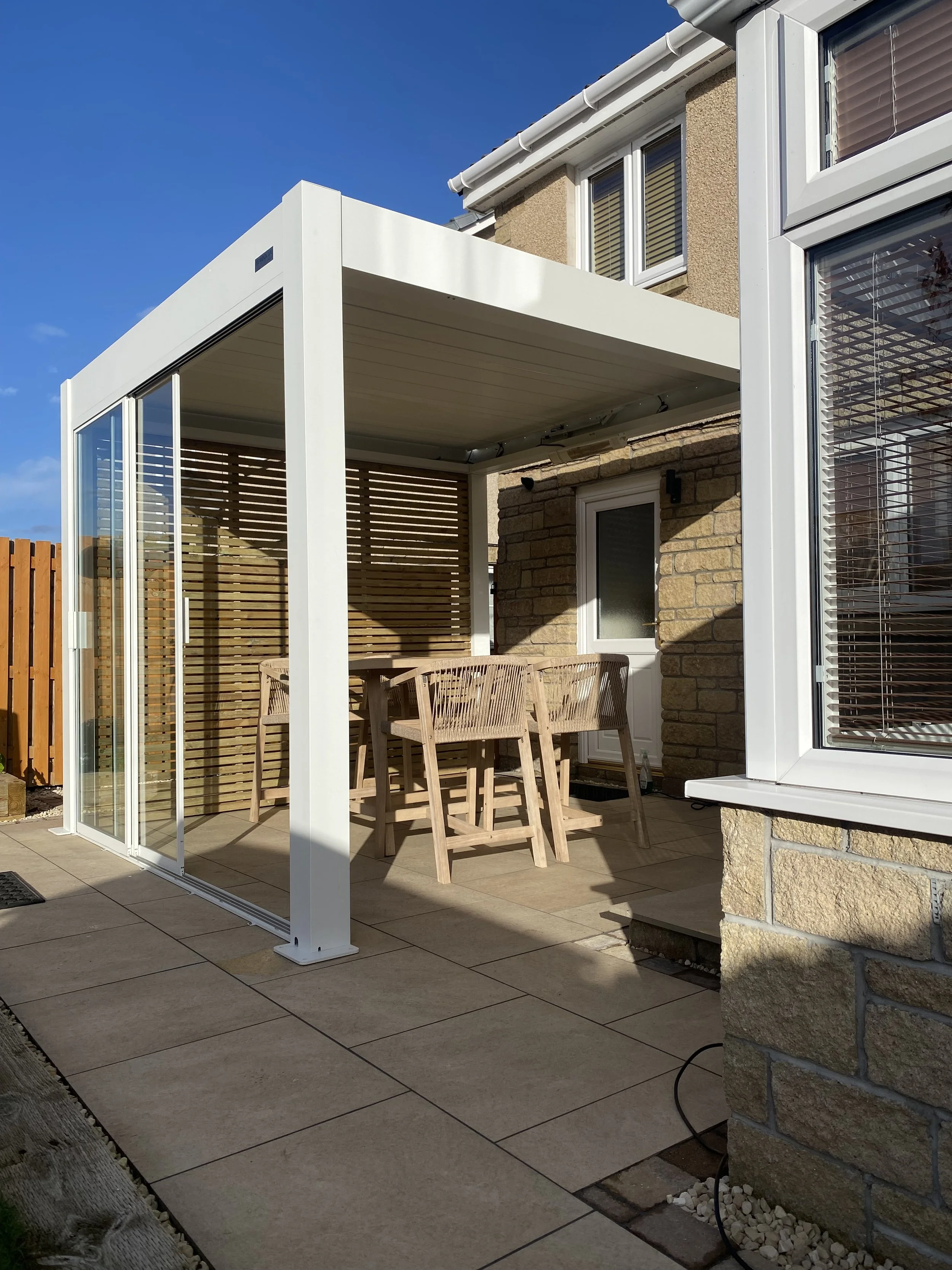 pergola and porcelain patio