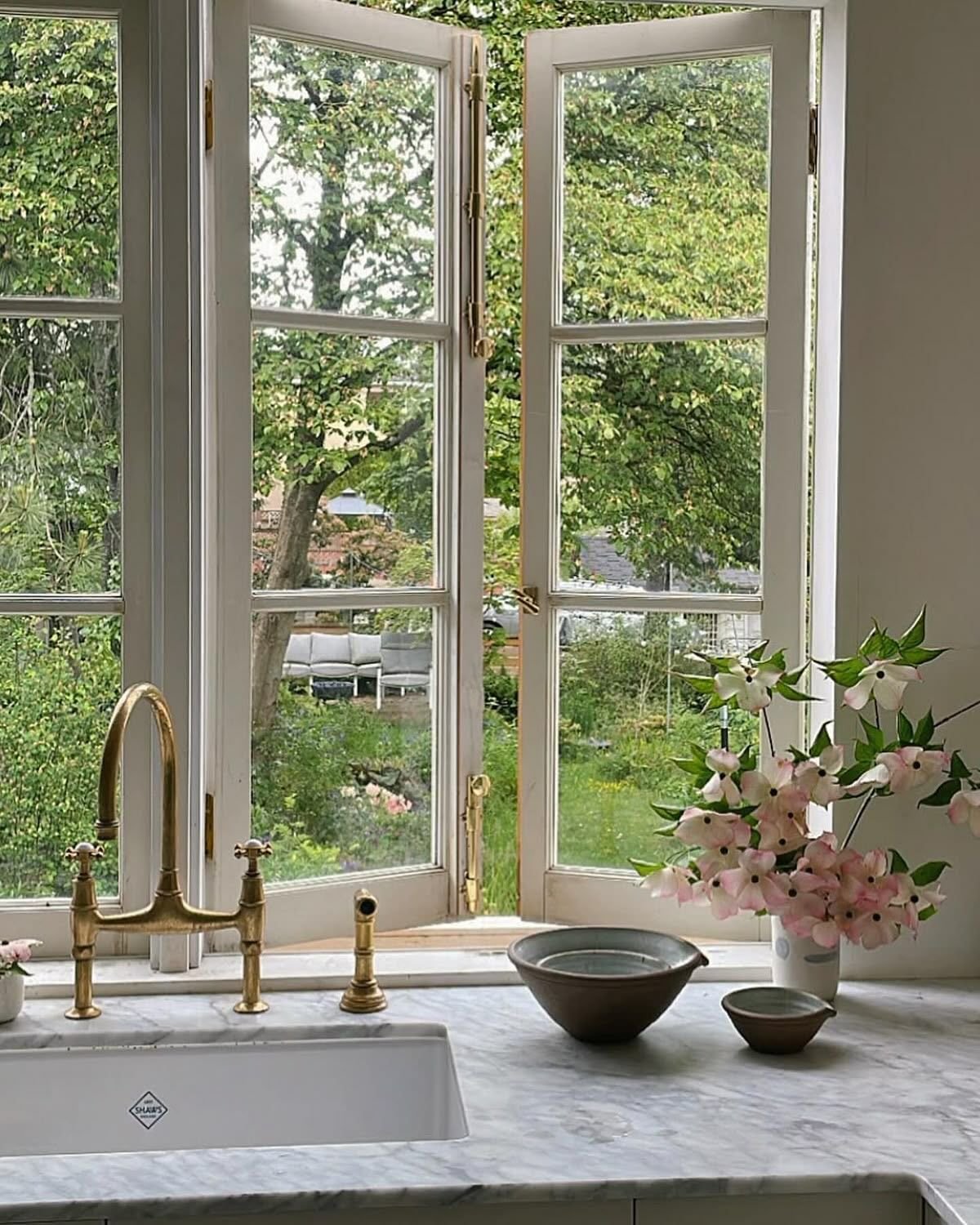 Timeless Kitche with Open French Window and natural materials
