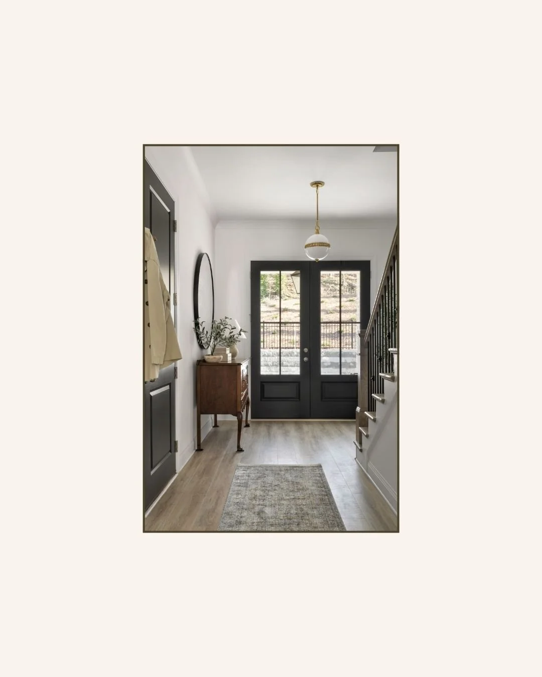 The first moments of a home should feel calm and considered.

Oversized double doors create a sense of arrival, while a single heirloom piece bring warmth and a feeling that the home has been collected over time. It is a reminder that an entry does n
