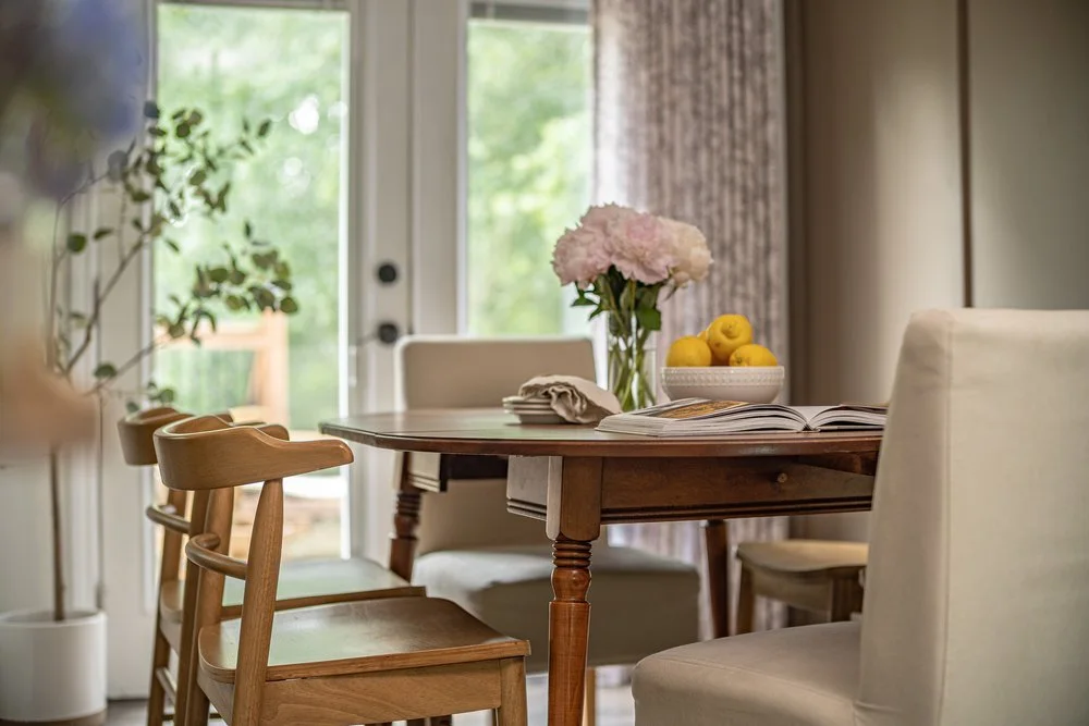 Timeless dining room design with vintage table and pink peonies for the perfect tablescape