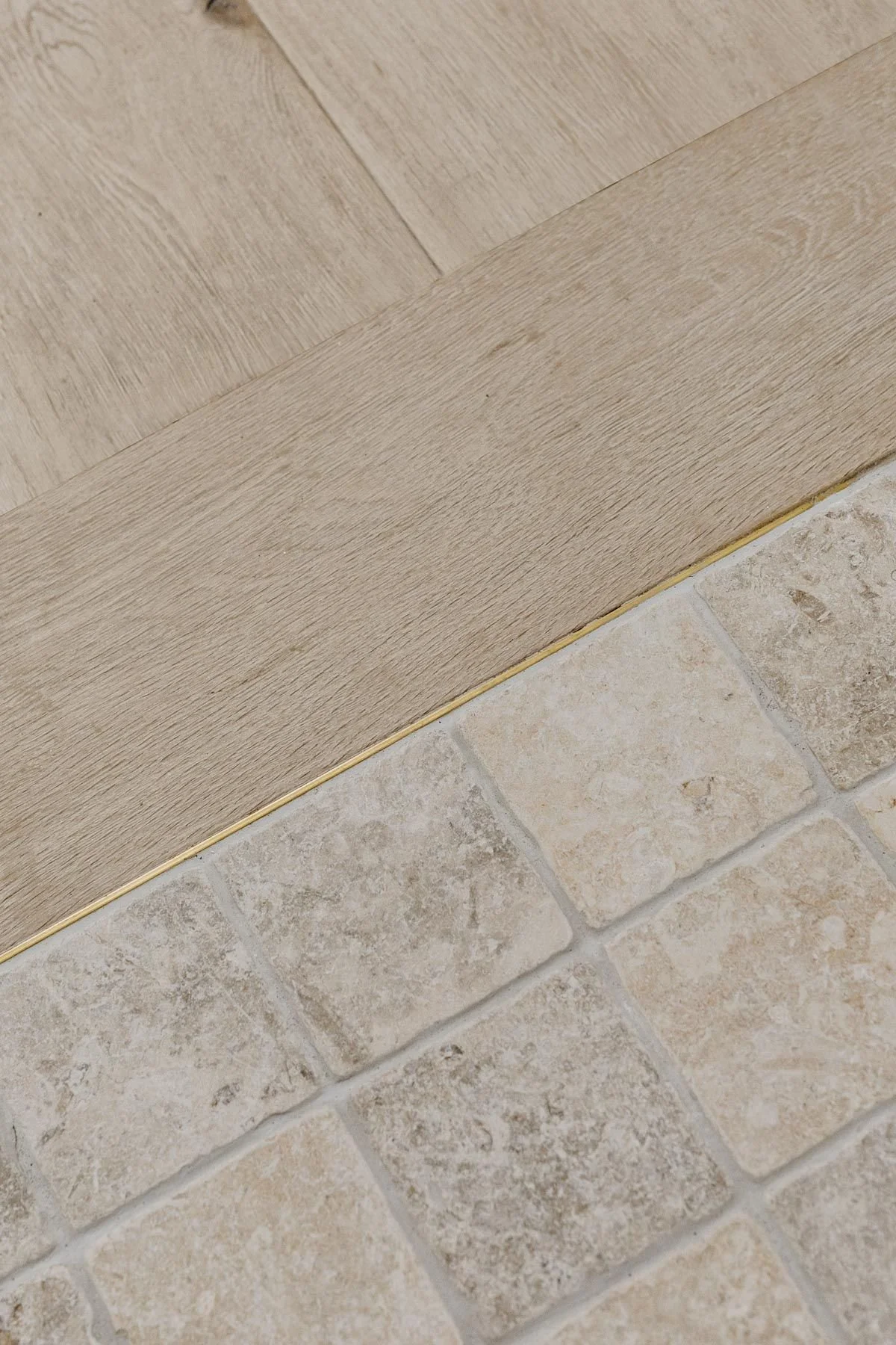 Stone Floor and Hardwood Flooring Transition in Modern Organic Home