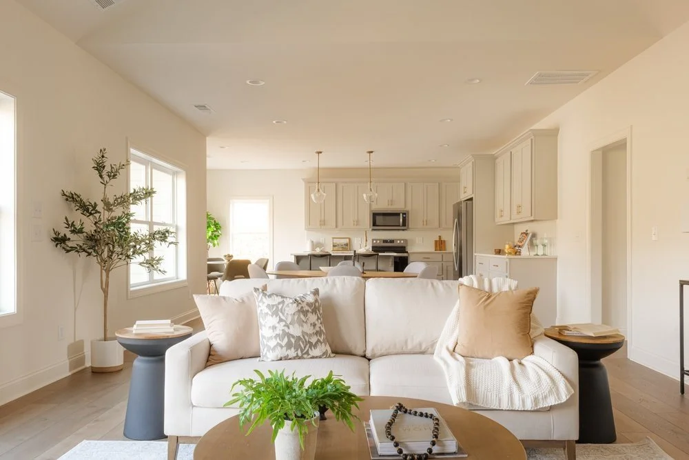 Living room sofa full view in open concept design for modern mountain home.