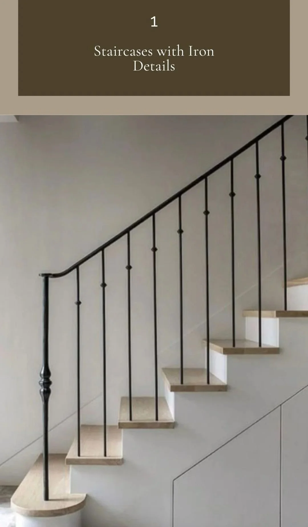 Timeless staircase with iron balusters in a custom build home designed by a Northeast Georgia interior designer, blending durability with refined architectural detail.