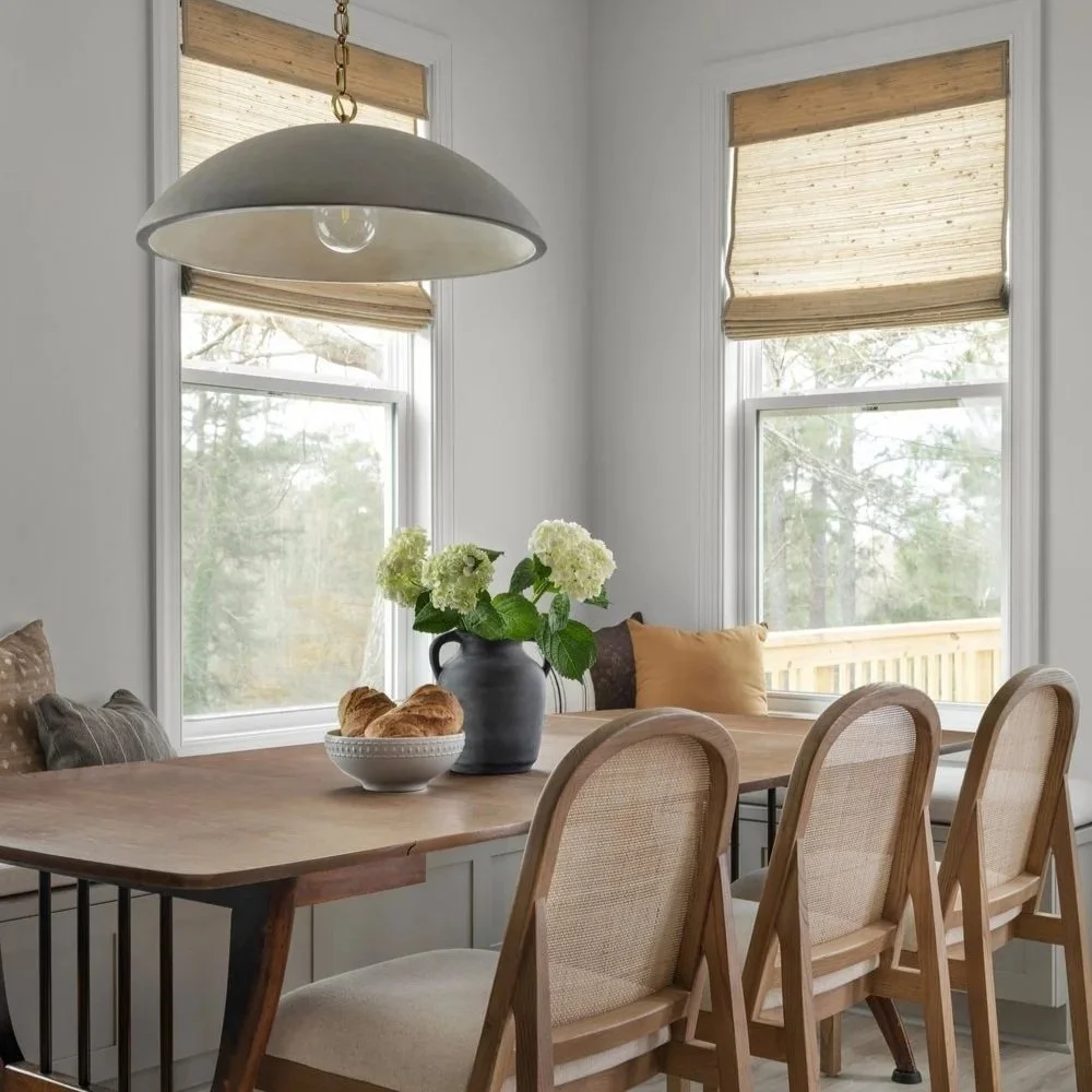 Luxury Breakfast Nook in Family Home with built in and custom roman shade